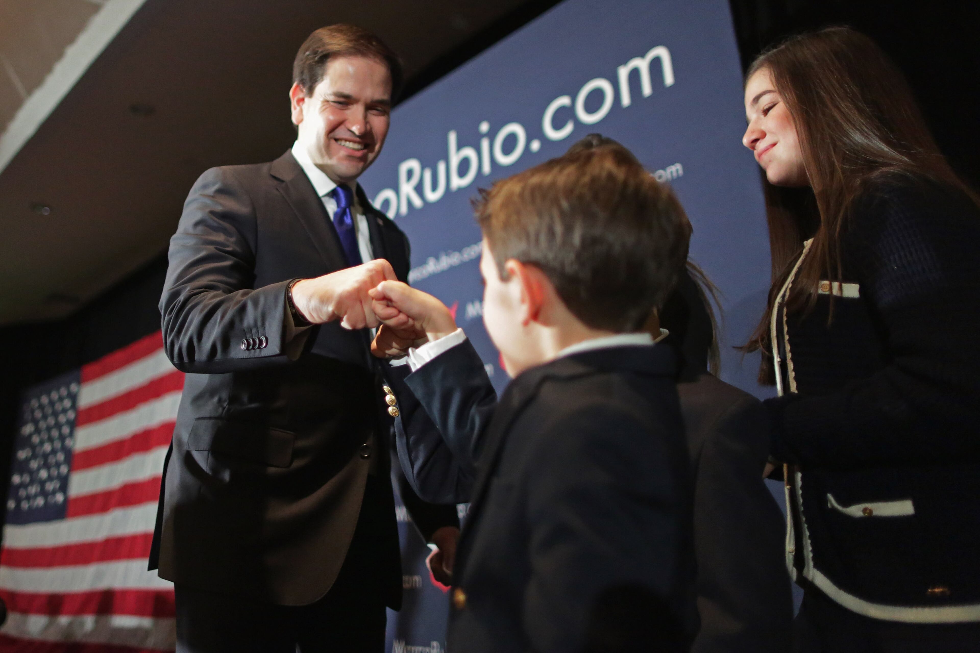 Republican presidential candidate Sen. Marco Rubio (R-FL) fist bumps his son Dominick after delivering remarks during a primary election night party with his family at the Radisson hotel February 9, 2016 in Manchester, New Hampshire. After a strong third-place showing in the Iowa caucuses, Rubio was hoping to prove his presidential staying power by pulling away from the pack and moving closer to Donald Trump at the polls. (Photo by Chip Somodevilla/Getty Images)