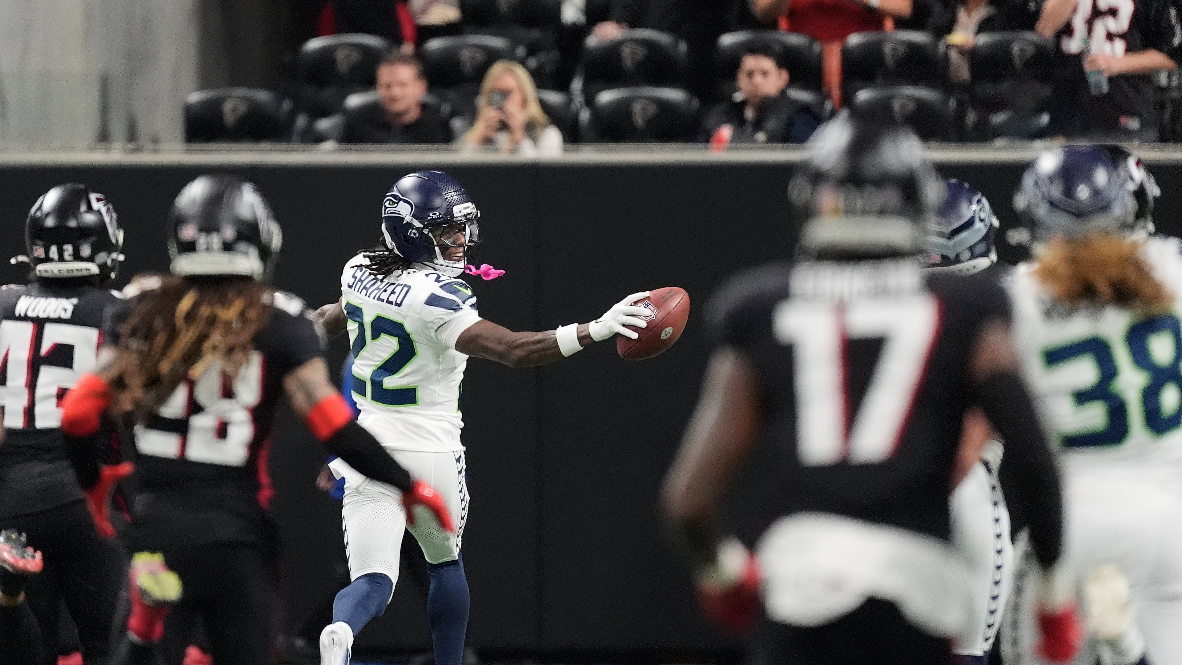 Seattle Seahawks wide receiver Rashid Shaheed looks back as he runs for a 100-yard touchdown on a kickoff return against the Atlanta Falcons during the second half of an NFL football game, Sunday, Dec. 7, 2025, in Atlanta. (Mike Stewart/AP)