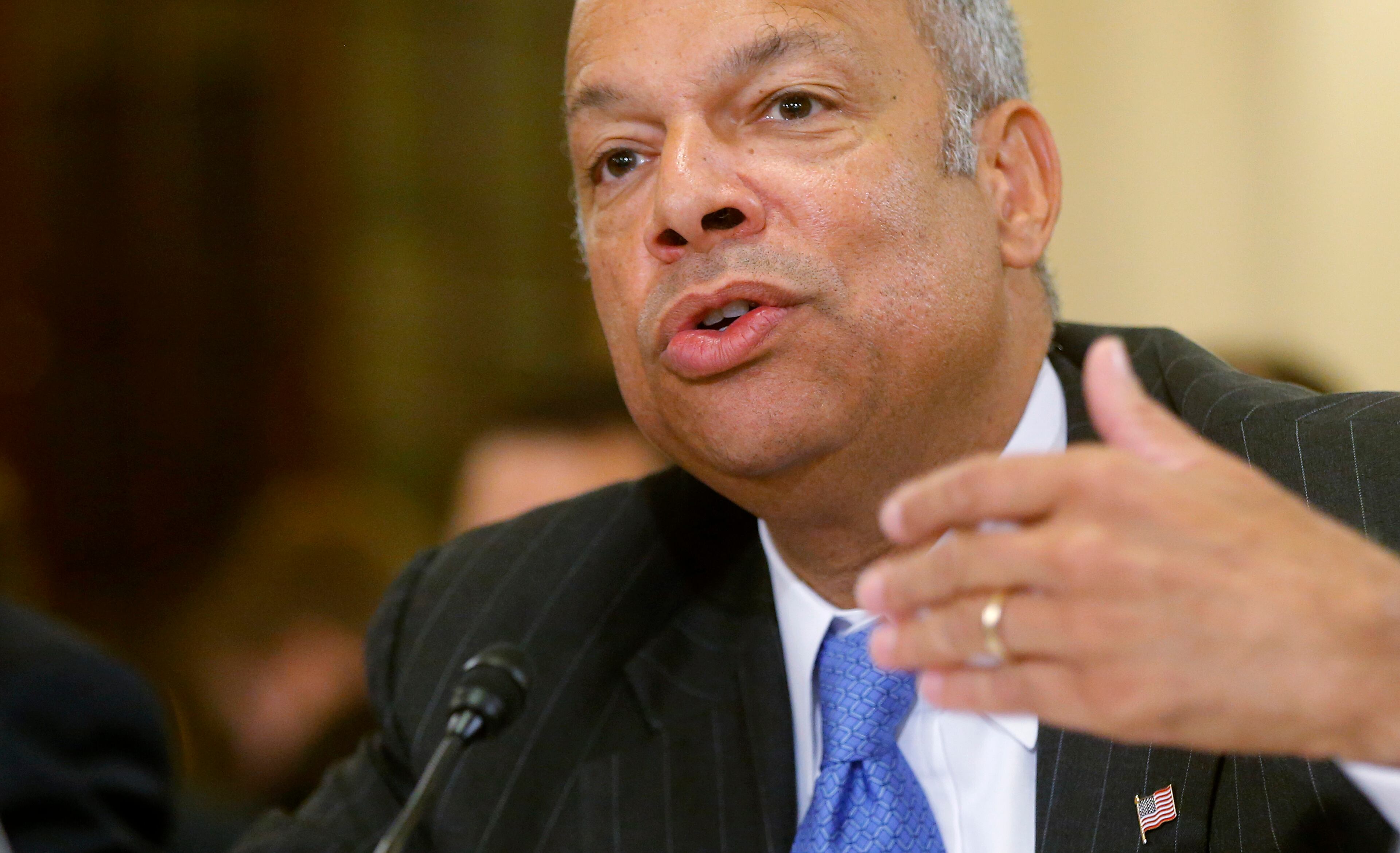 FILE - In this June 24, 2014, file photo, Homeland Security Secretary Jeh Johnson testifies on Capitol Hill in Washington. Johnson is ordering increased security measures at some overseas airports offering direct flights to the United States. The Homeland Security Department would not immediately say July 2 whether the increased measures were in response to intelligence about a specific threat. But a U.S. counterterrorism official says American intelligence has seen indications that certain terrorist groups in Yemen and Syria are working on a bomb that could make it through airport security undetected. (AP Photo/Charles Dharapak, File)