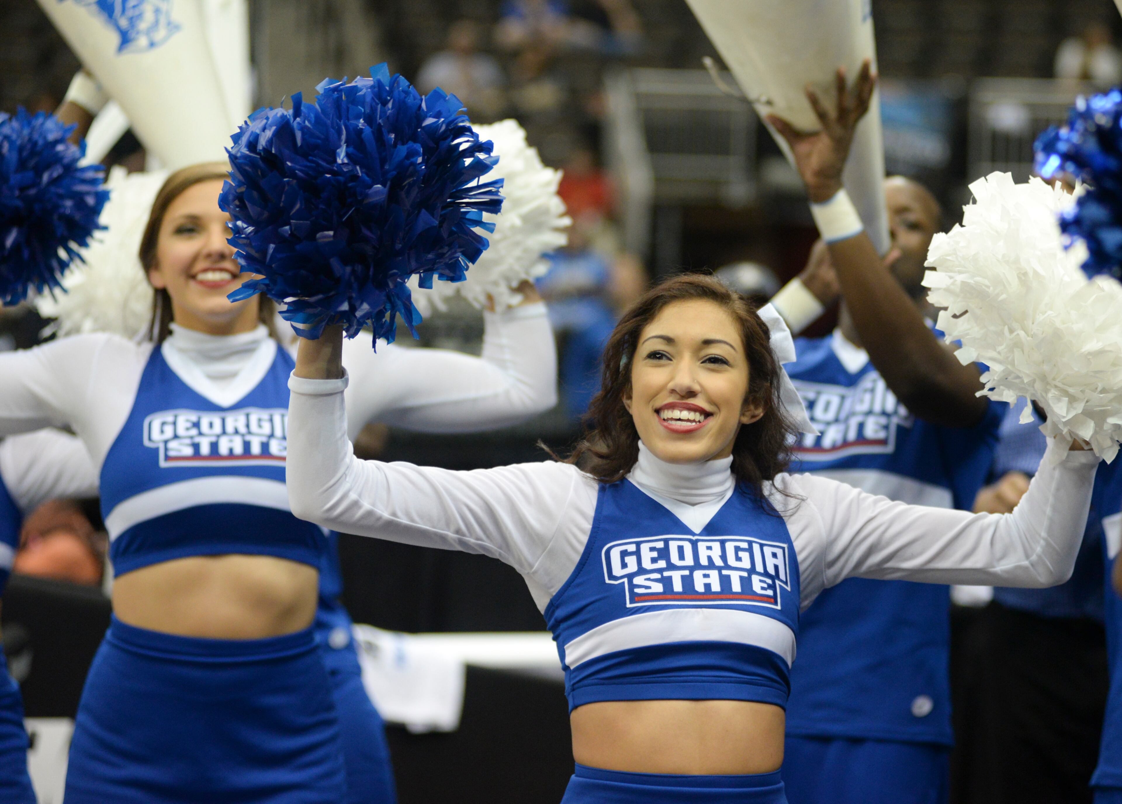 Georgia State cheerleaders cheer before the start of an NCAA tournament third round college basketball game against Xavier, Saturday, March 21, 2015, in Jacksonville, Fla. (AP Photo/Rick Wilson)