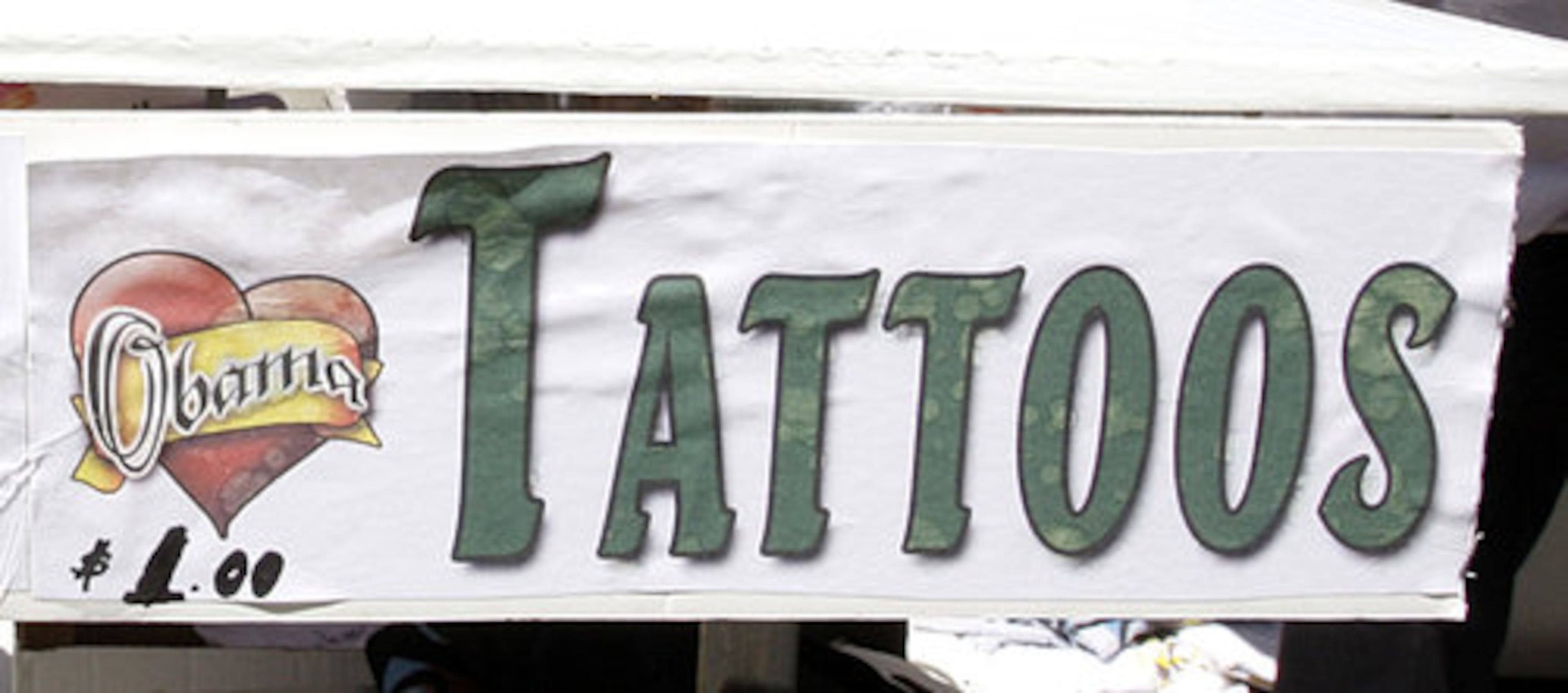 Hardcore Obama supporters have gotten "inked" this week in Denver. The temporary tattoos were selling for $1.