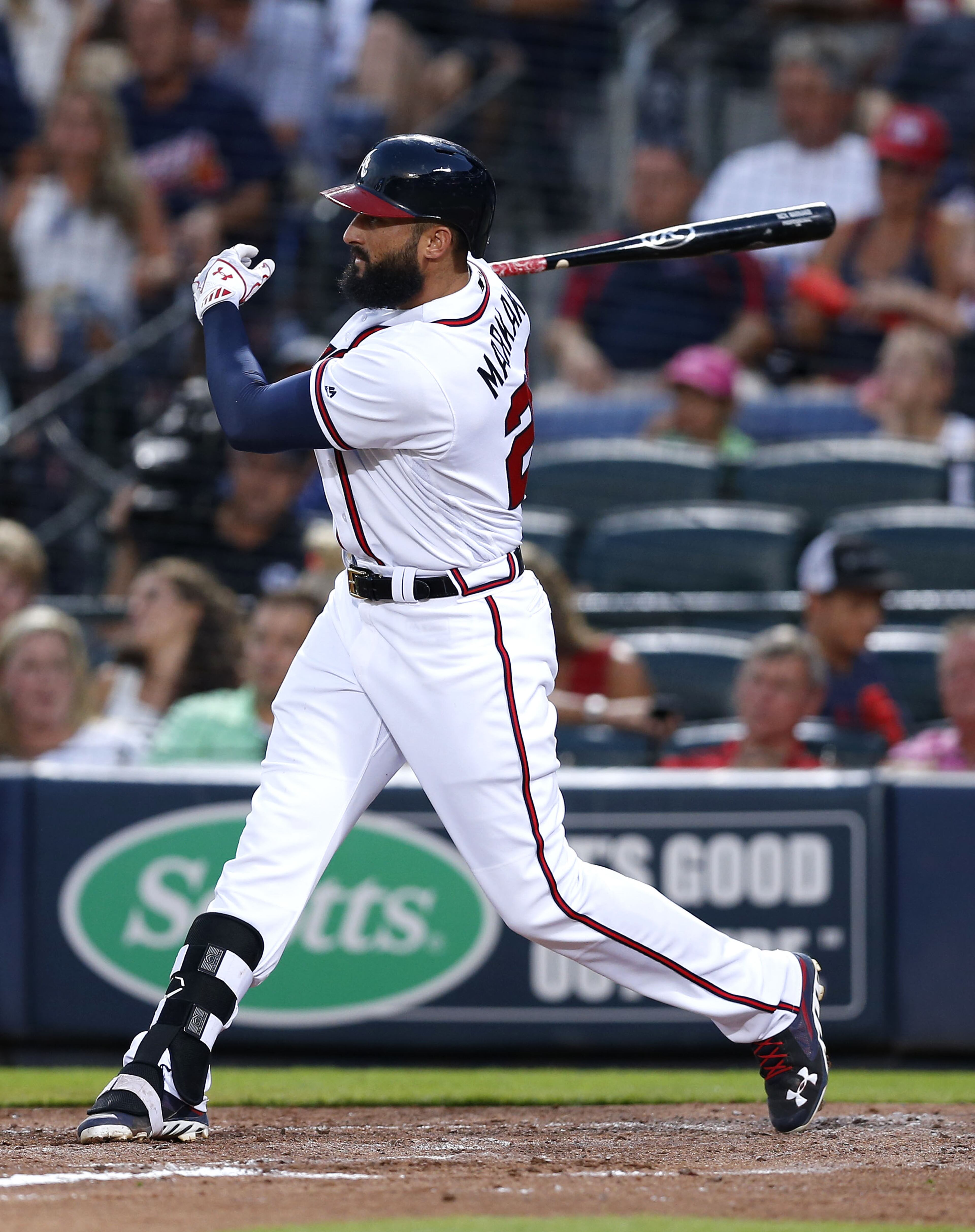 ATLANTA, GA - JULY 29: Right fielder Nick Markakis #22 of the Atlanta Braves hits an RBI single in the third inning during the game against the Philadelphia Phillies at Turner Field on July 29, 2016 in Atlanta, Georgia. (Photo by Mike Zarrilli/Getty Images)