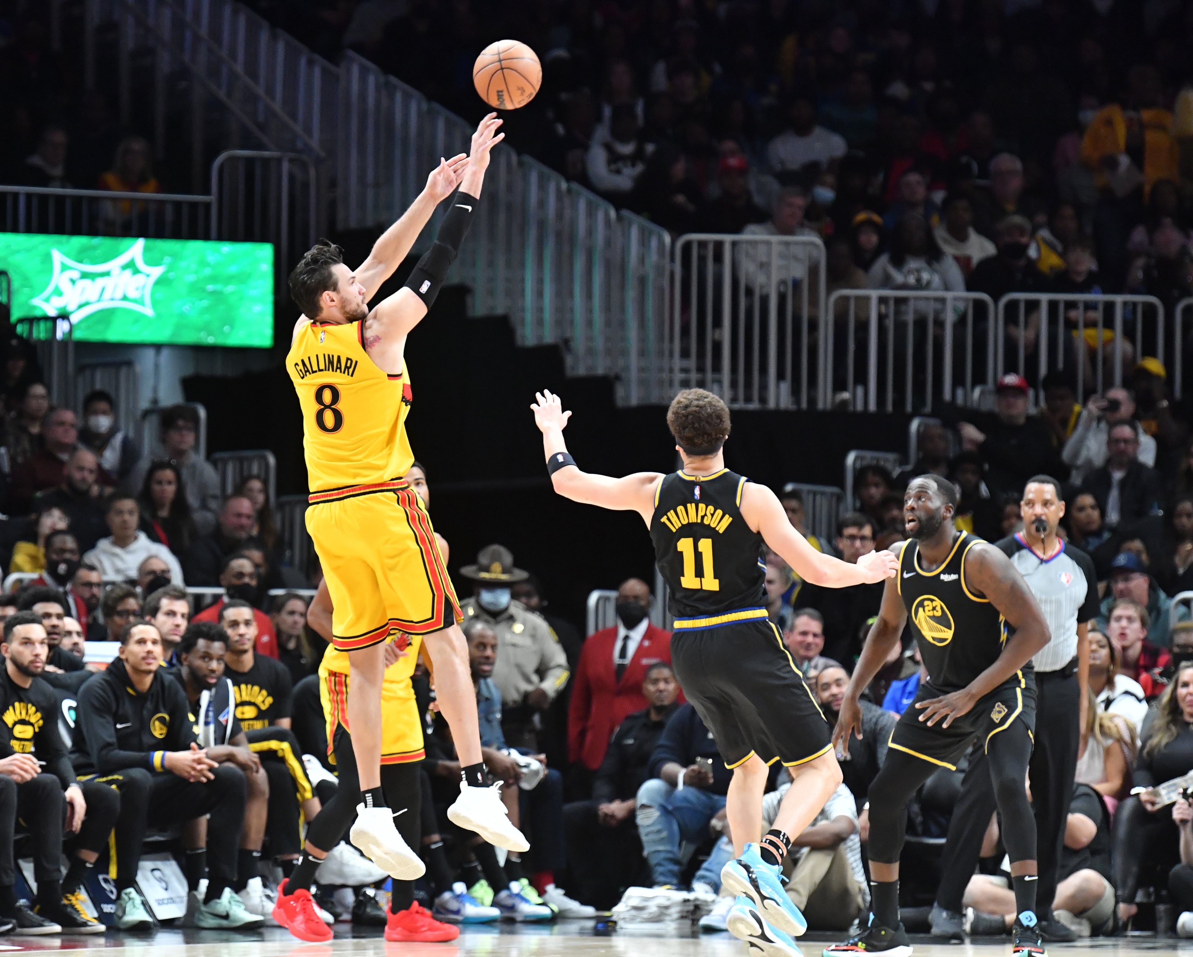Hawks' forward Danilo Gallinari (8) gets off a shot over Golden State Warriors' guard Klay Thompson (11) during the first half in an NBA basketball game at State Farm Arena on Friday, March 25, 2022. (Hyosub Shin / Hyosub.Shin@ajc.com)