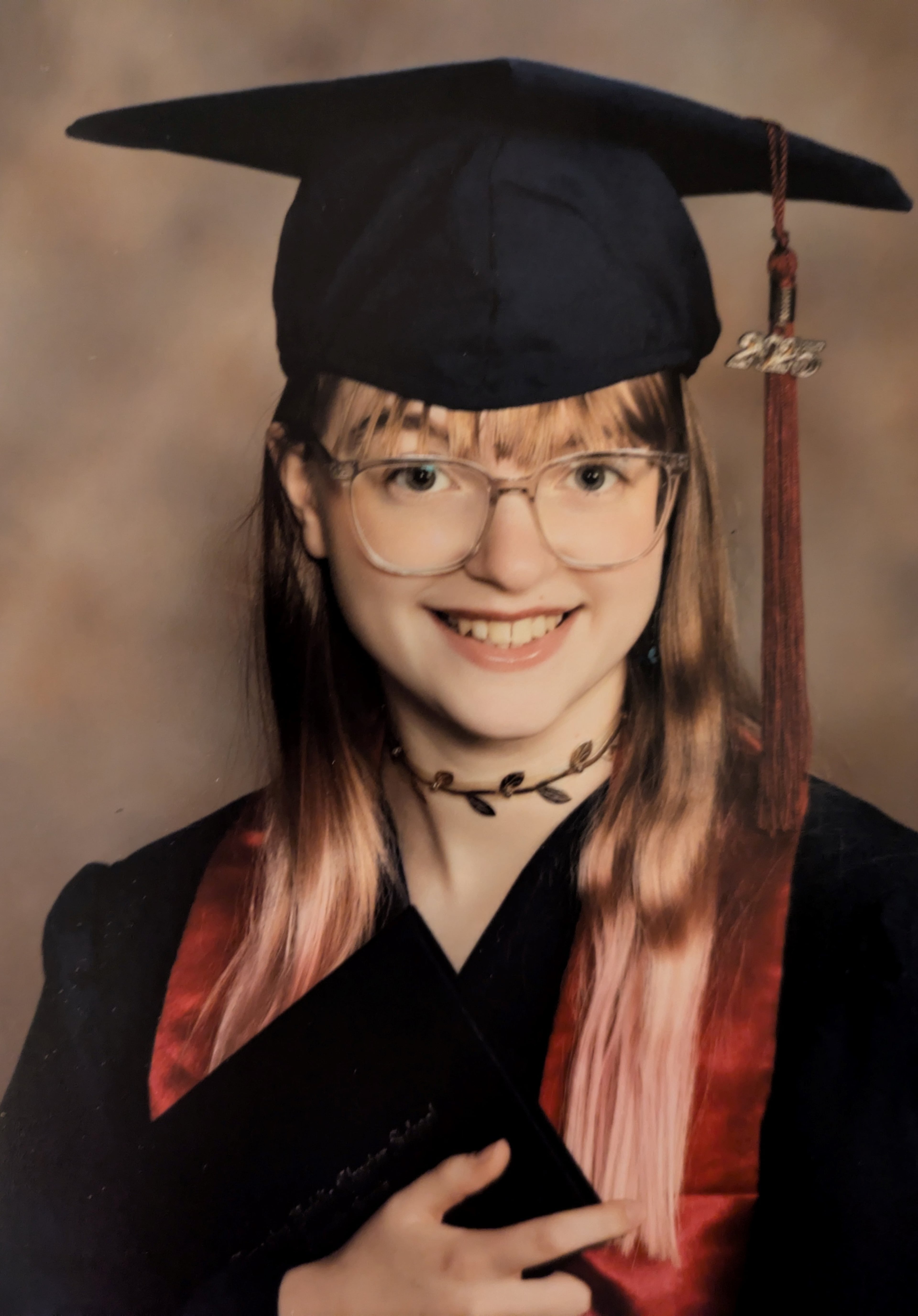 Raccoon Toppen is the 2025 valedictorian of Tapestry Public Charter School in DeKalb County. Toppen plans to study animal science at Berry College. "What worries me about the future? The economy, obviously." (Handout)