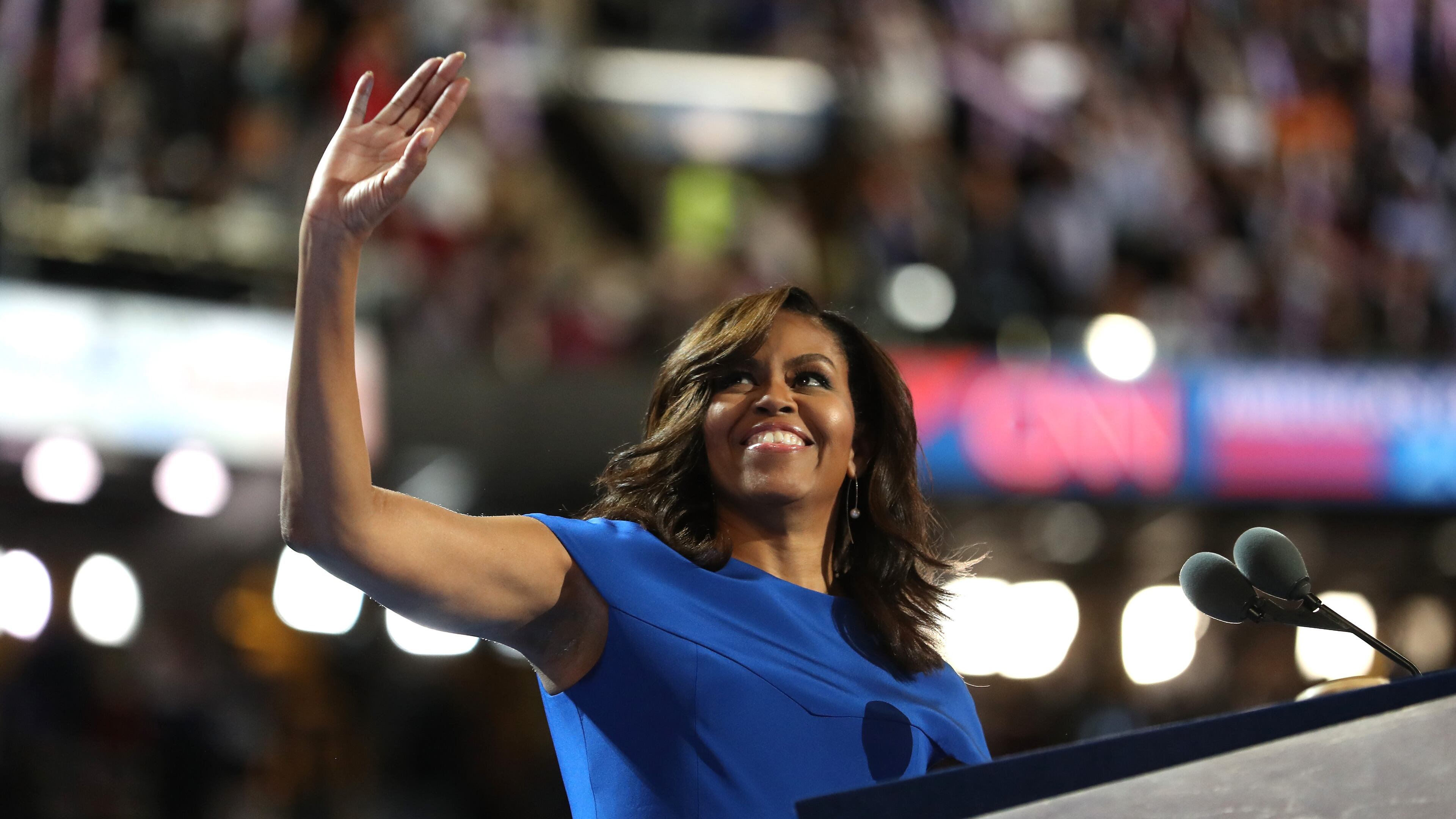PHILADELPHIA, PA - JULY 25: First lady Michelle Obama acknowledges the crowd after delivering remarks on the first day of the Democratic National Convention at the Wells Fargo Center, July 25, 2016 in Philadelphia, Pennsylvania. An estimated 50,000 people are expected in Philadelphia, including hundreds of protesters and members of the media. The four-day Democratic National Convention kicked off July 25. (Photo by Joe Raedle/Getty Images)