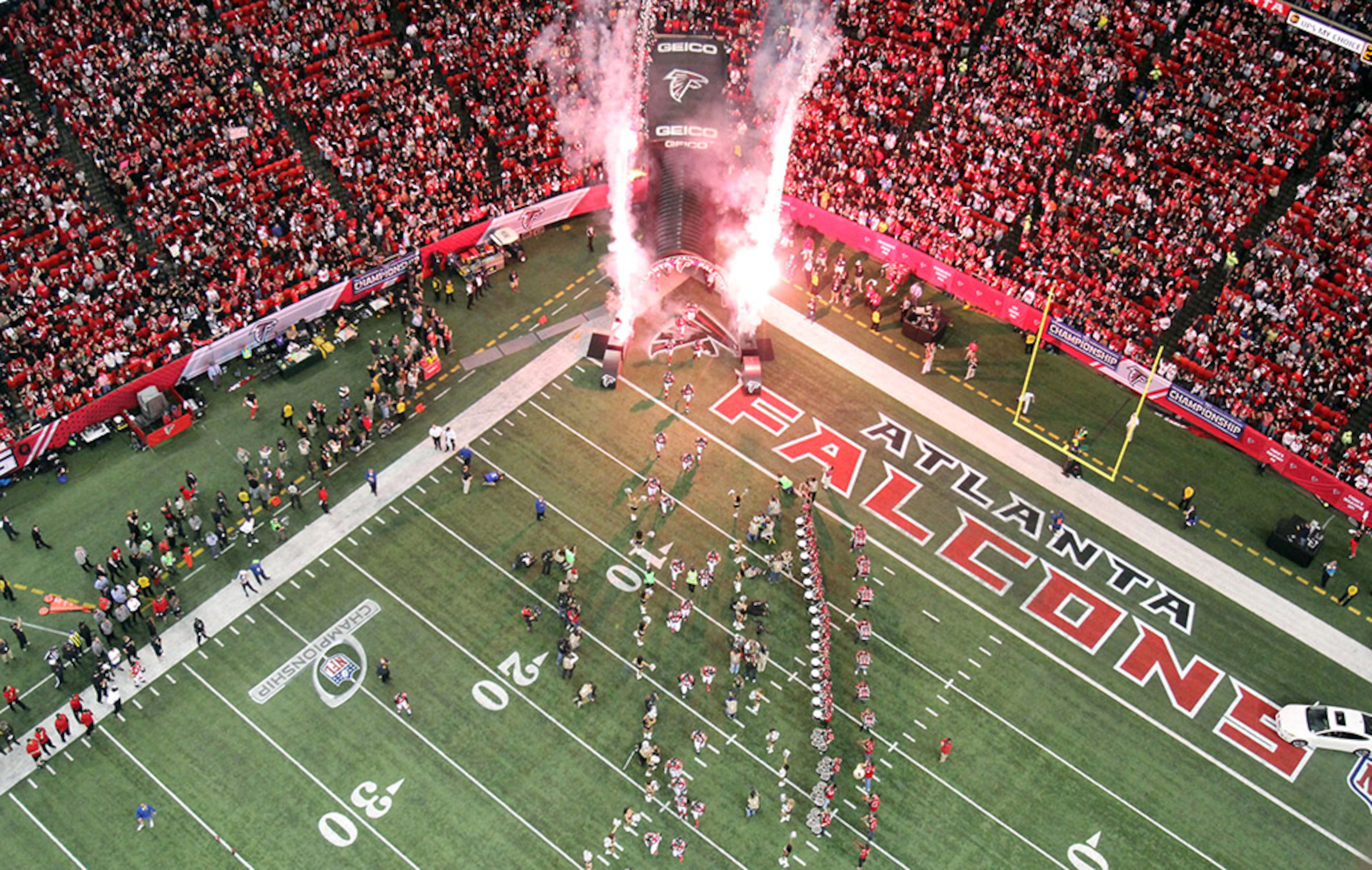January 20, 2013 - Atlanta, Ga: Atlanta Falcons players run out of the tunnel before their game against the San Francisco 49ers in the NFC Championship game at the Georgia Dome Sunday afternoon in Atlanta, Ga., January 20, 2013. JASON GETZ / JGETZ@AJC.COM