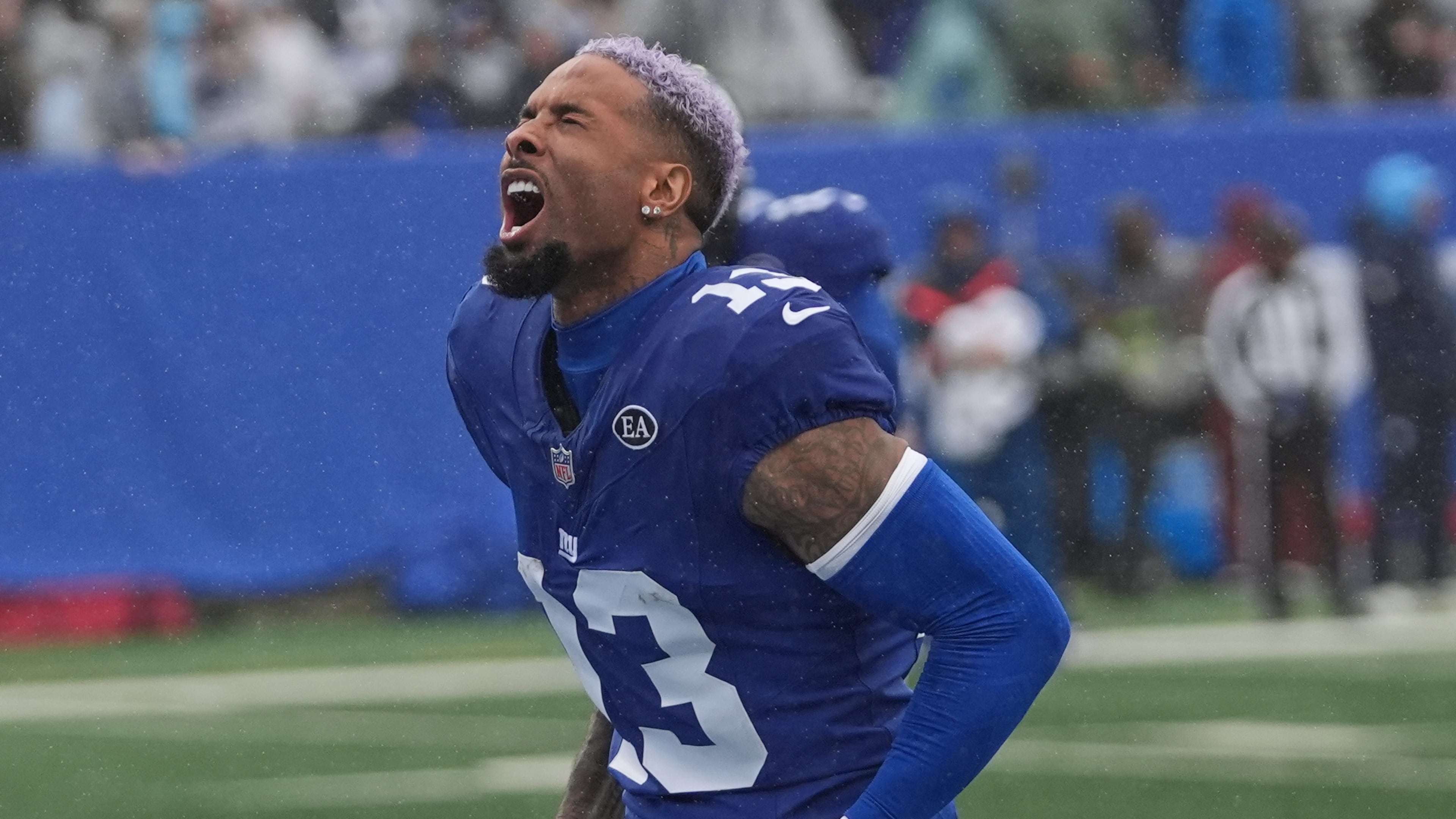 New York Giants wide receiver Odell Beckham Jr. (13) screams as he runs onto the field before an NFL football game against the Tennessee Titans in East Rutherford, N.J., Sunday, Sept. 27, 2026. (AP Photo/Frank Franklin II)