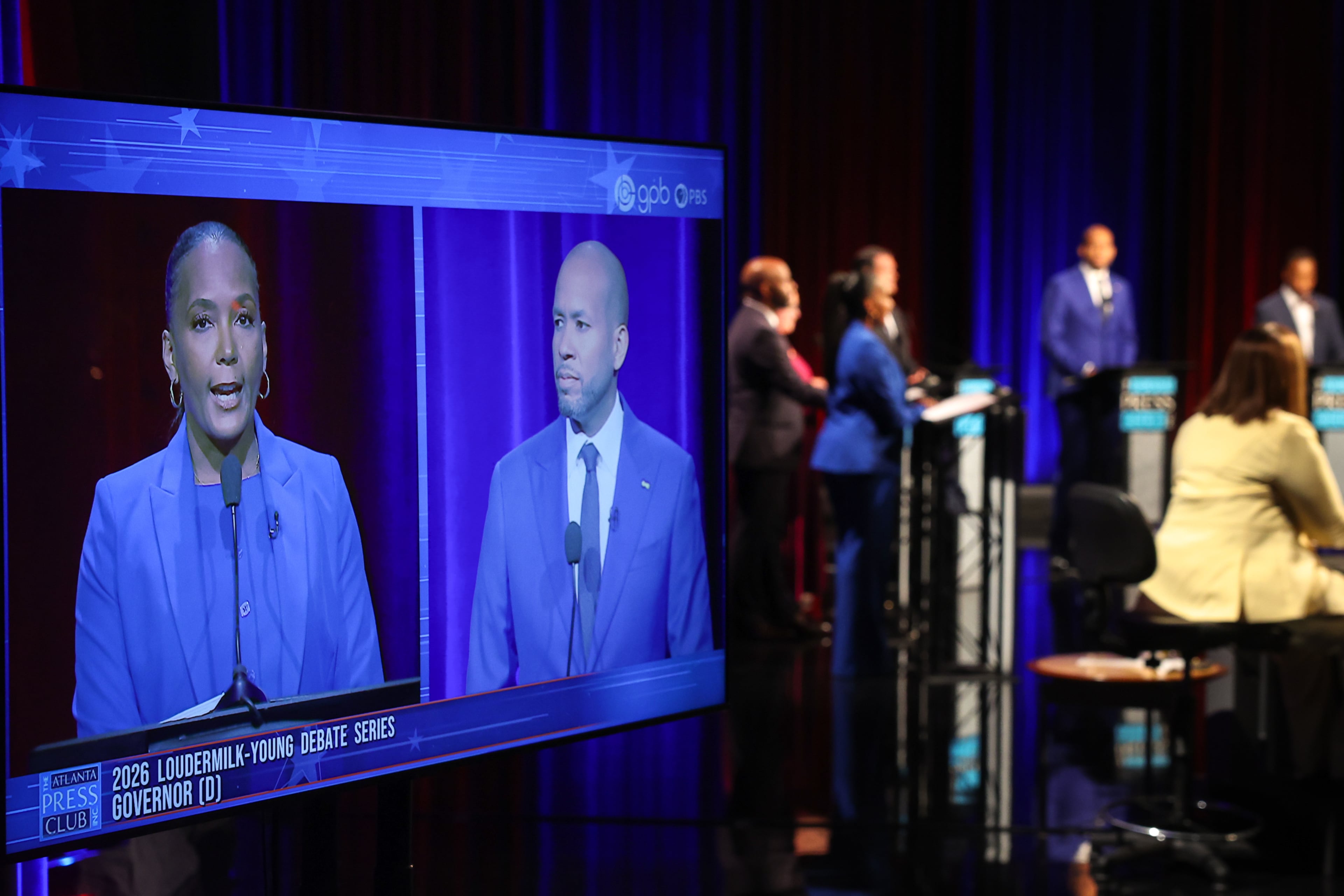 Democratic candidates for governor, Keisha Lance Bottoms, left, and Jason Esteves appear on screen at the Atlanta Press Club Loudermilk-Young primary election debate at Georgia Public Broadcasting last week. (Arvin Temkar/AJC)