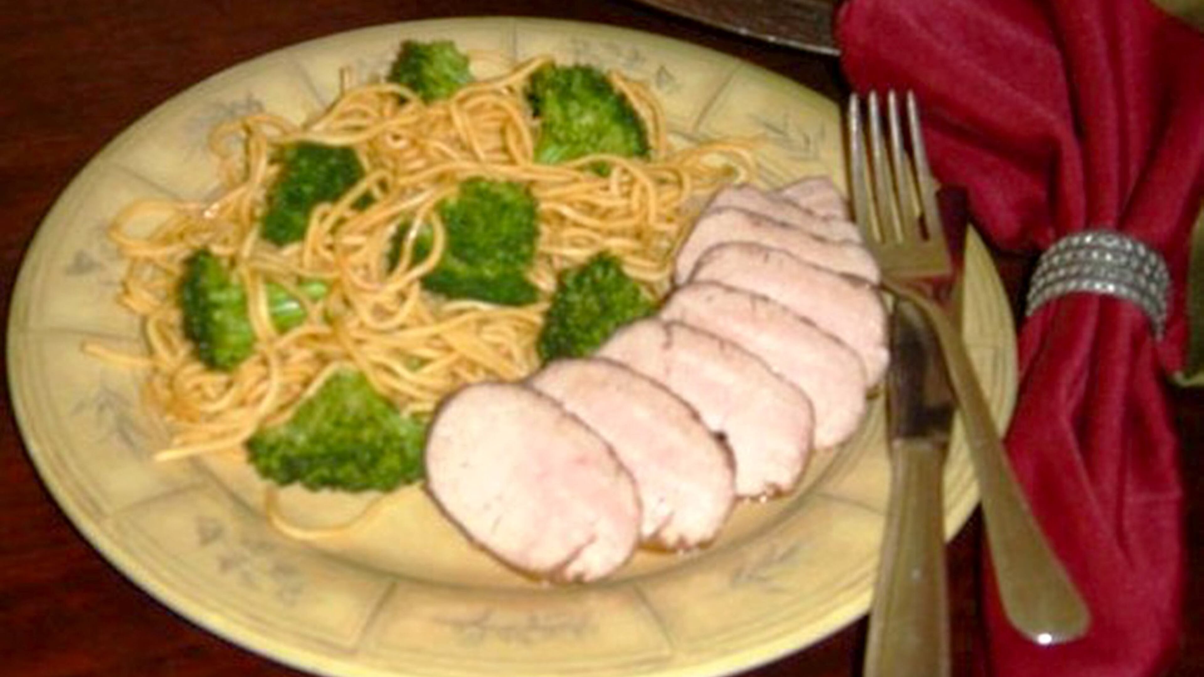 Asian-Flavored Pork Tenderloin with Stir-fried Broccoli and Noodles. (Linda Gassenheimer)
