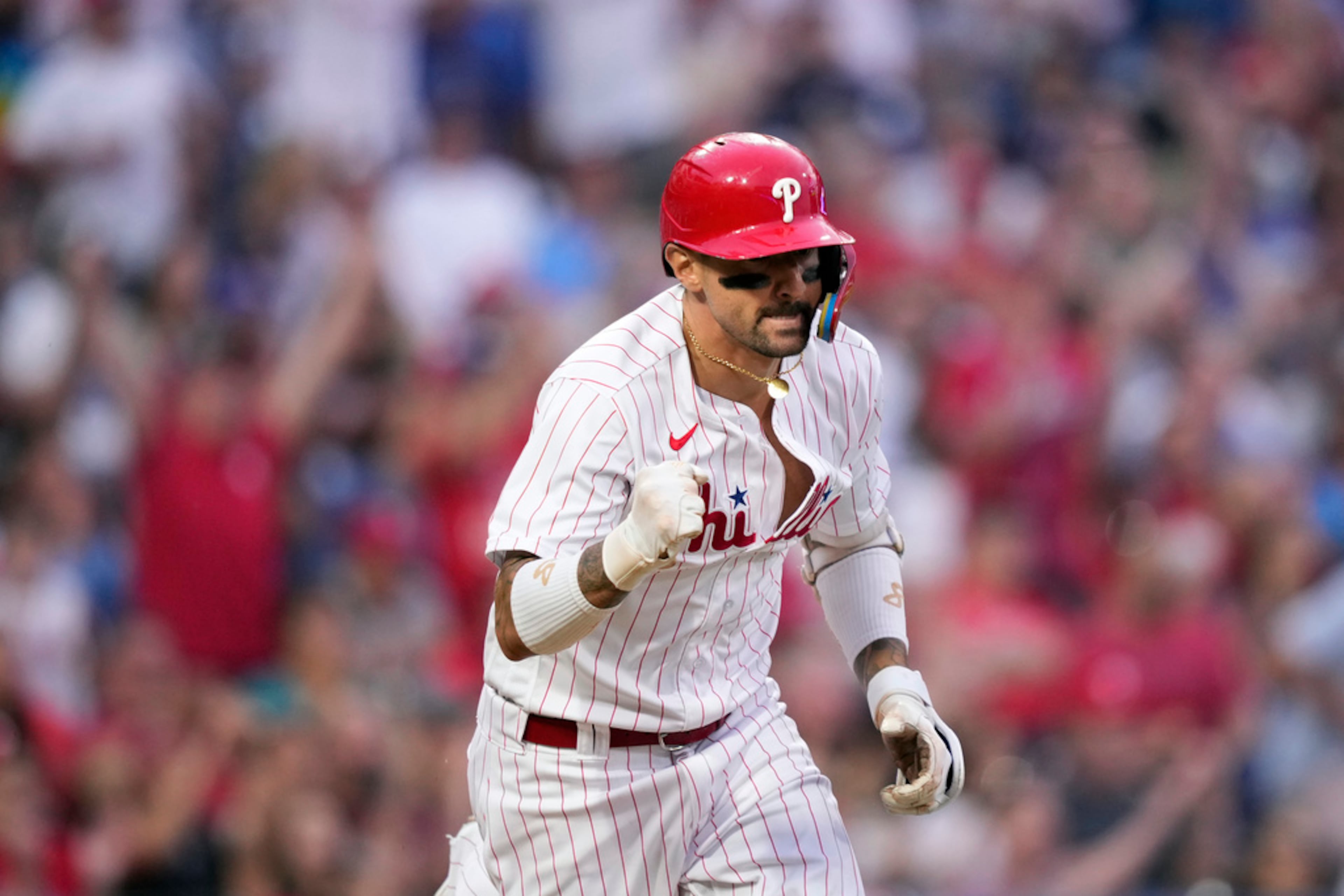Philadelphia Phillies' Nick Castellanos reacts after hitting a run-scoring single against Atlanta Braves pitcher Spencer Strider during the fifth inning of a baseball game, Tuesday, June 20, 2023, in Philadelphia. (AP Photo/Matt Slocum)