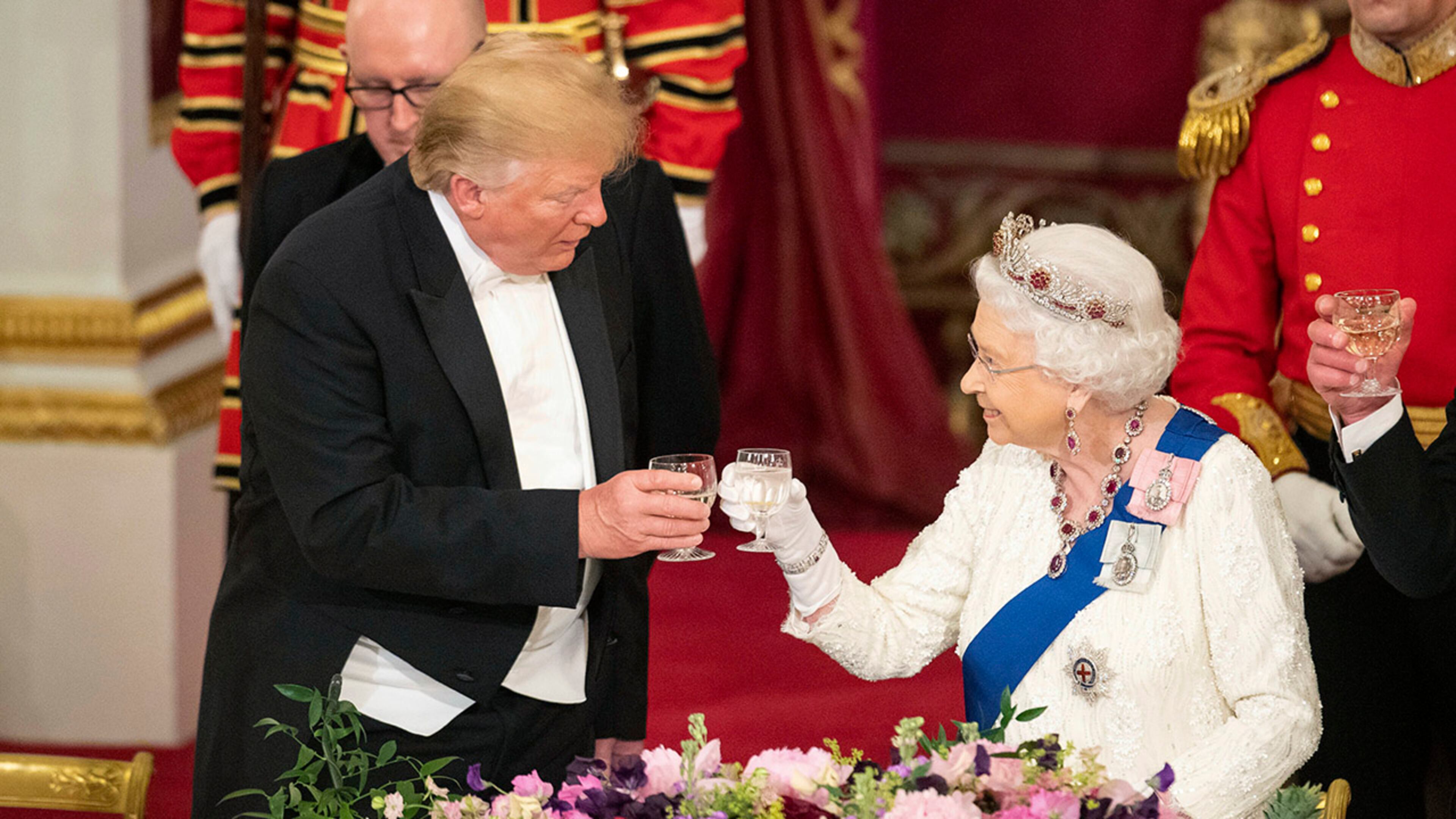 President Donald Trump, left, and Queen Elizabeth II make a toast during the state banquet at Buckingham Palace in London, Monday, June 3, 2019. Trump is on a three-day state visit to Britain.