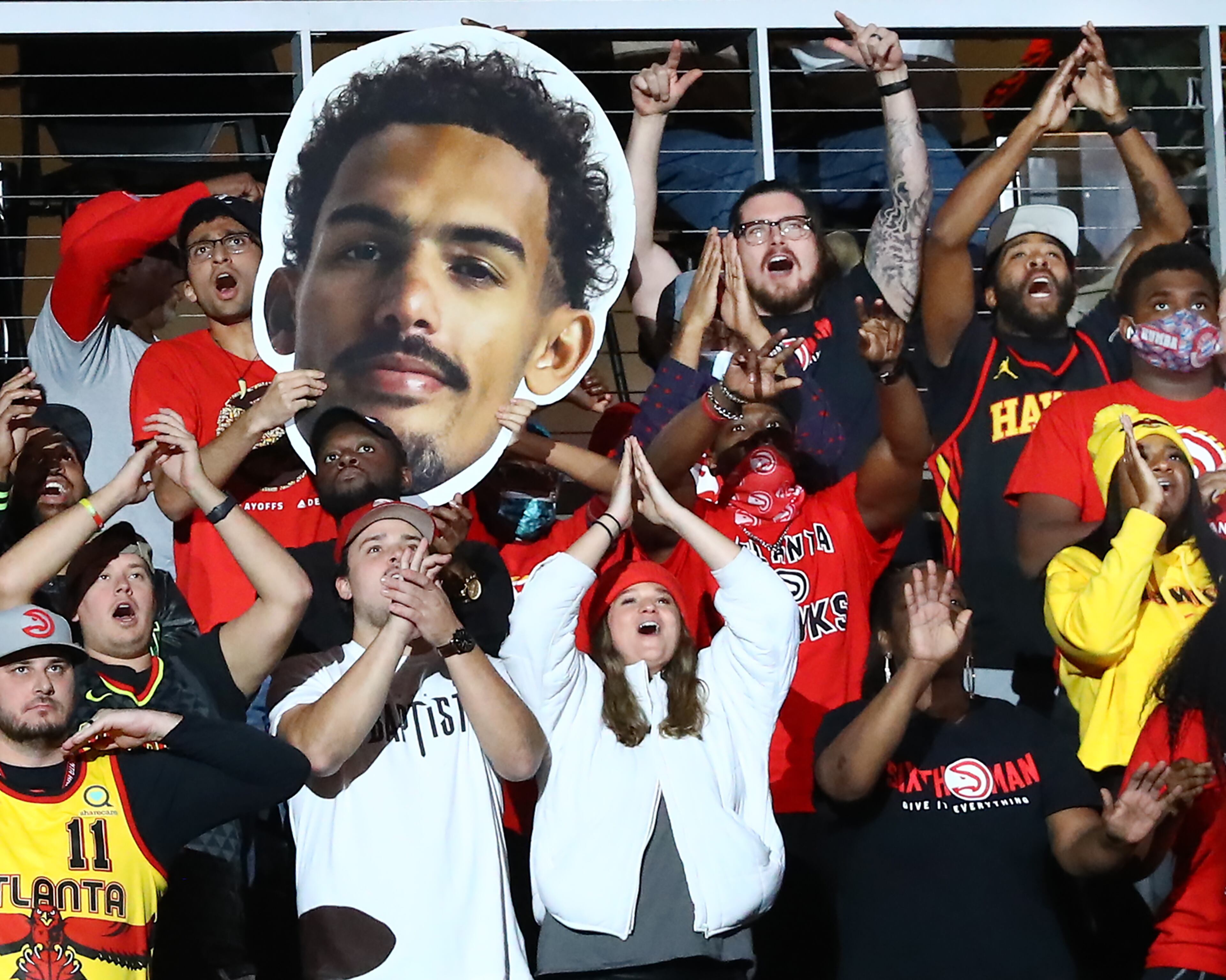Hawks fans cheer their team to a 113-101 victory over the Oklahoma City Thunder in a NBA basketball game on Monday, Nov. 22, 2021, in Atlanta. “Curtis Compton / Curtis.Compton@ajc.com”