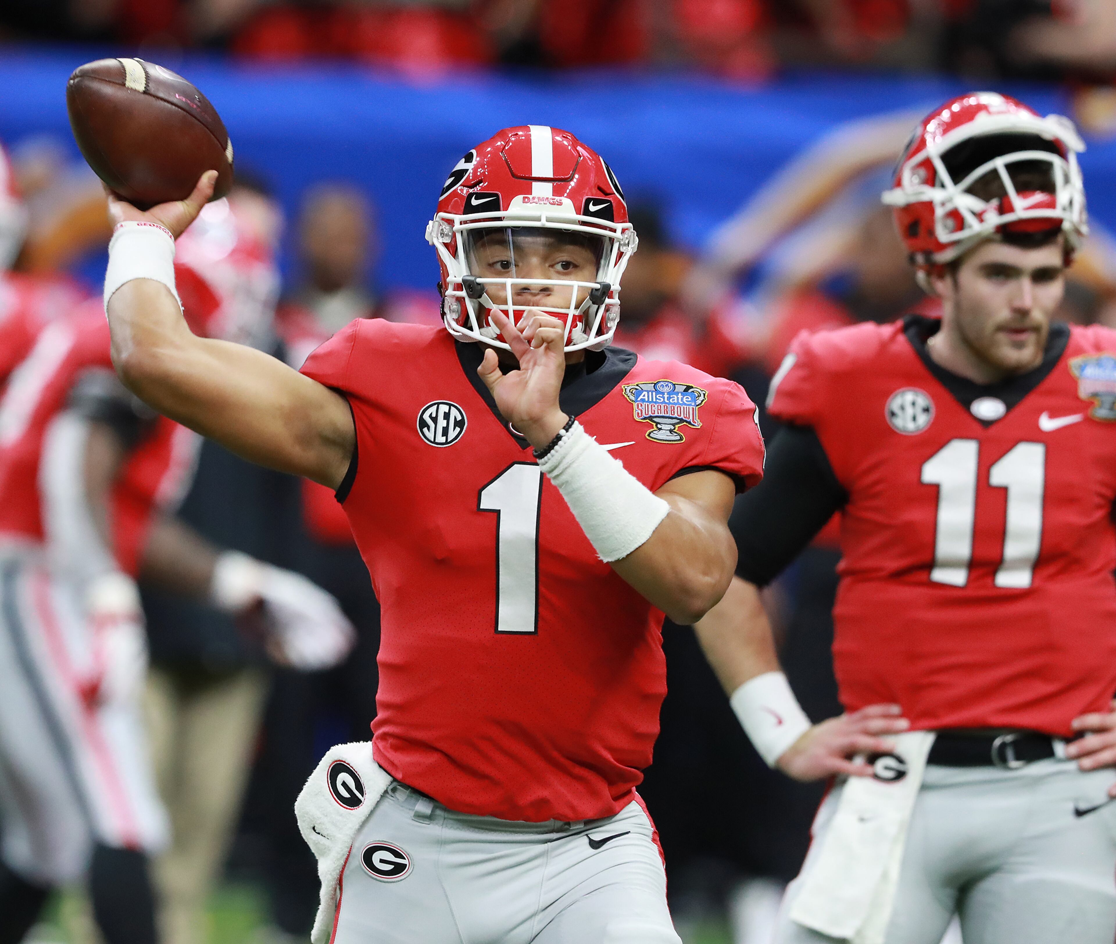 Jan. 01, 2019 New Orleans: Georgia quarterbacks Justin Fields and Jake Fromm prepare to play Texas in the Allstate Sugar Bowl at Mercedes-Benz Superdome on Tuesday, Jan. 1, 2019, in New Orleans. Curtis Compton/ccompton@ajc.com