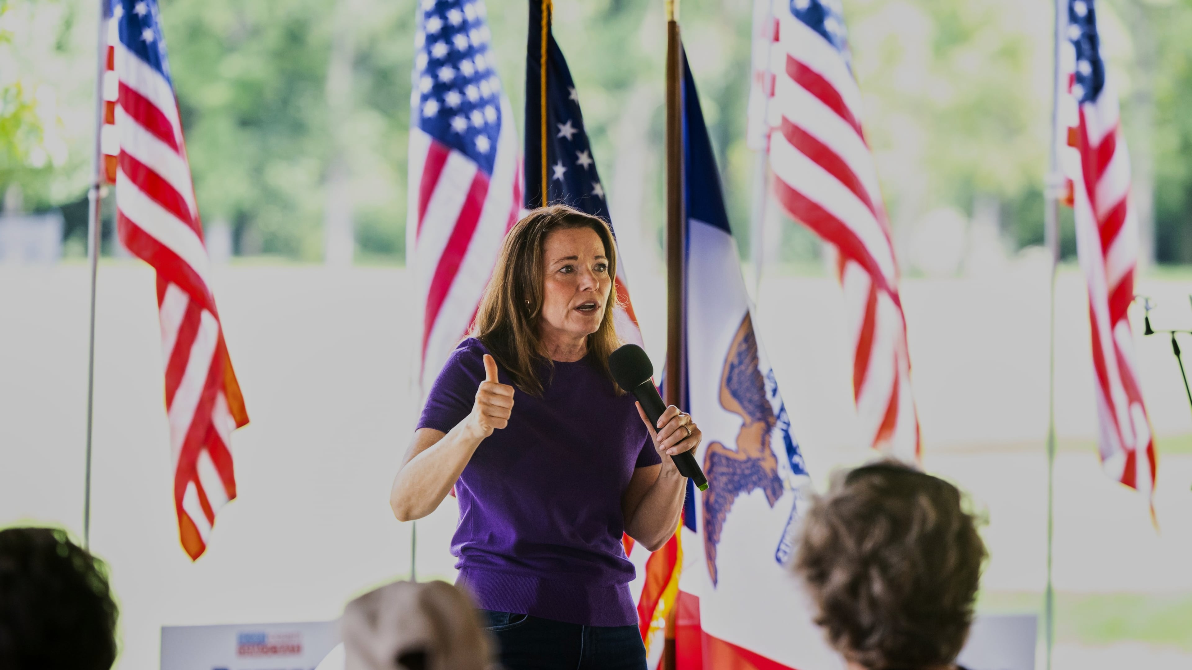 Christina Bohannan, Democratic candidate for U.S. House, speaks during the Scott County Democrats Annual Family Picnic, in Bettendorf, Iowa, Sunday, Aug. 16, 2026. (AP Photo/Joseph Cress)