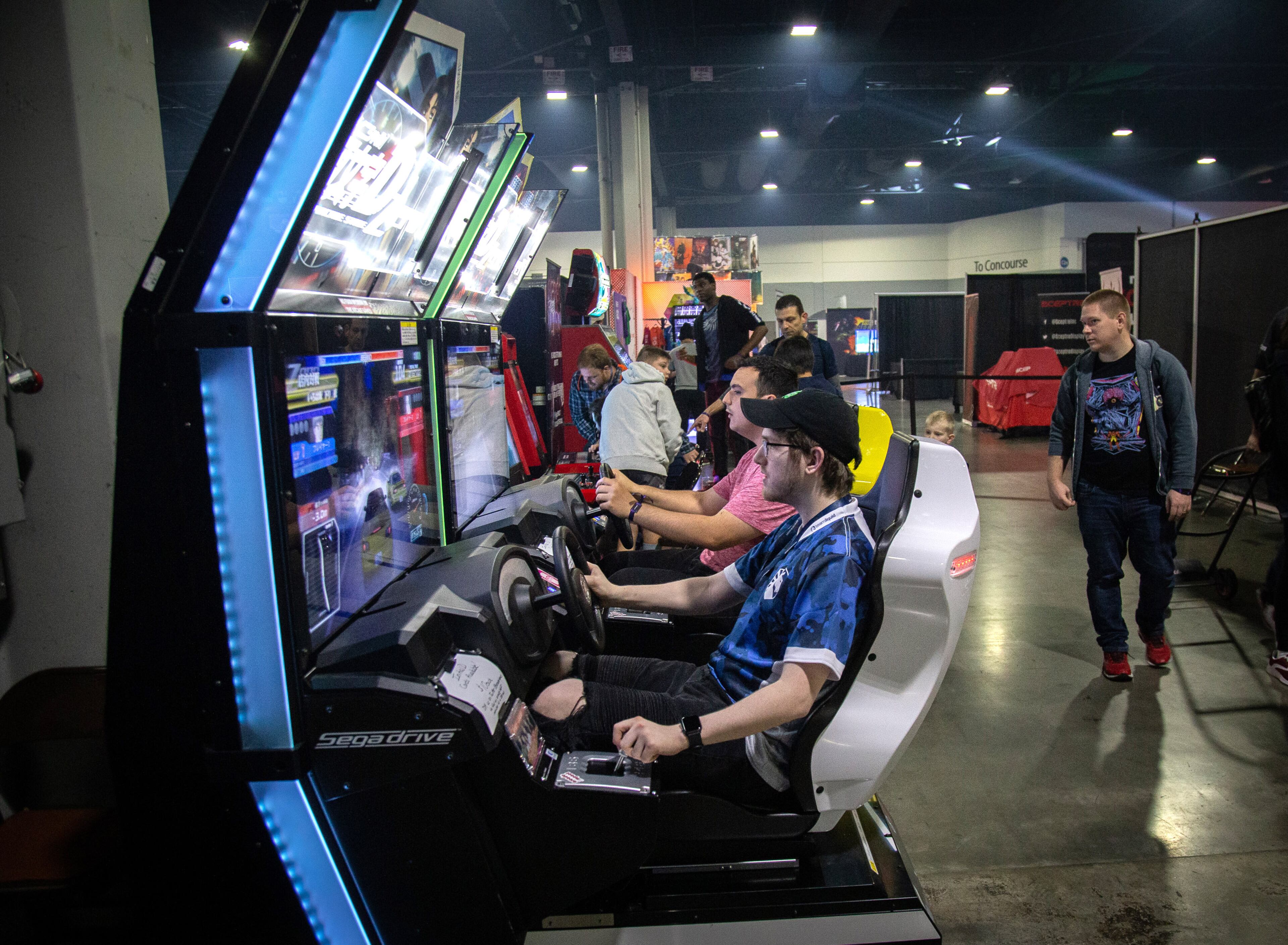 People race cars in the arcade game D Zero during DreamHack Atlanta at the Georgia World Congress Center Sunday, November 17, 2019. STEVE SCHAEFER / SPECIAL TO THE AJC