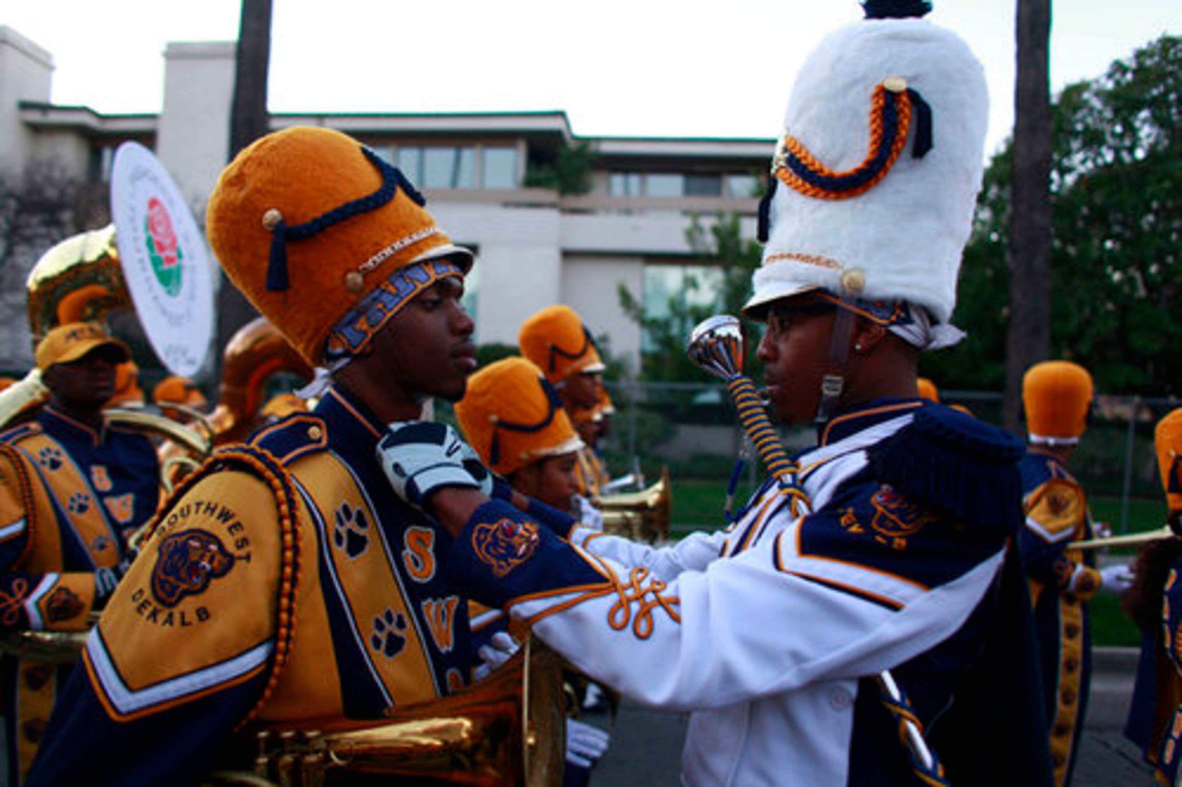 Members of the 230-student Southwest DeKalb High School Marching Panther Band from Decatur, prepare before setting off in the 122nd Rose Parade in Pasadena, Calif.