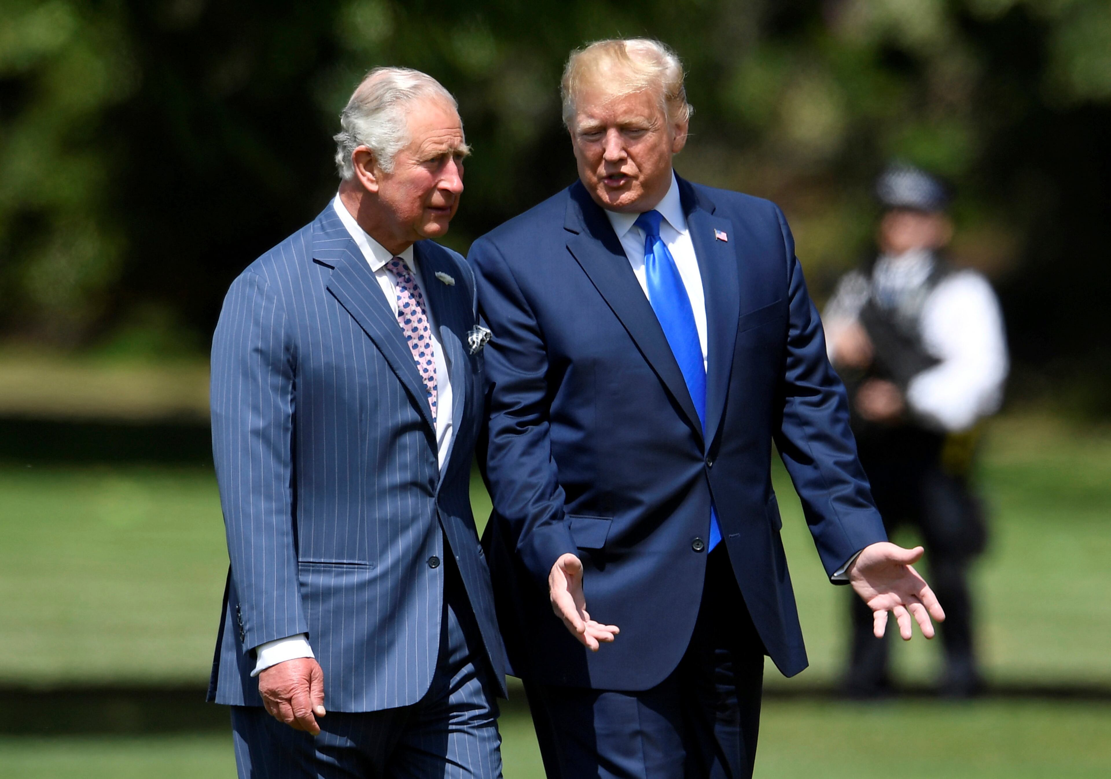 Britain's Prince Charles, left, meets U.S. President Donald Trump after he arrived at Buckingham Palace, in London, Monday, June 3, 2019. Trump is on a three-day state visit to Britain. (Toby Melville/Pool Photo via AP)