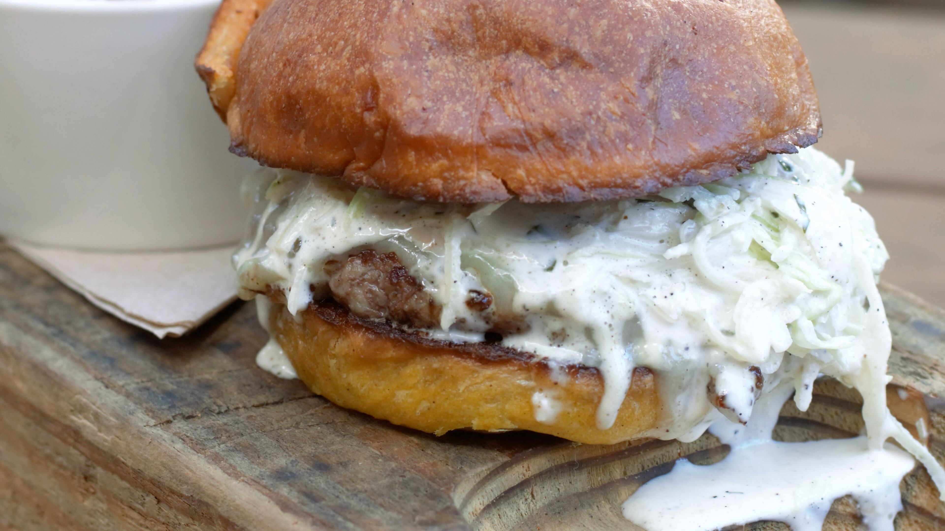 Bite into this victory burger at Venkman's, which recently snagged first place in the Best Burger Battle. Photo credit: Henri Hollins.