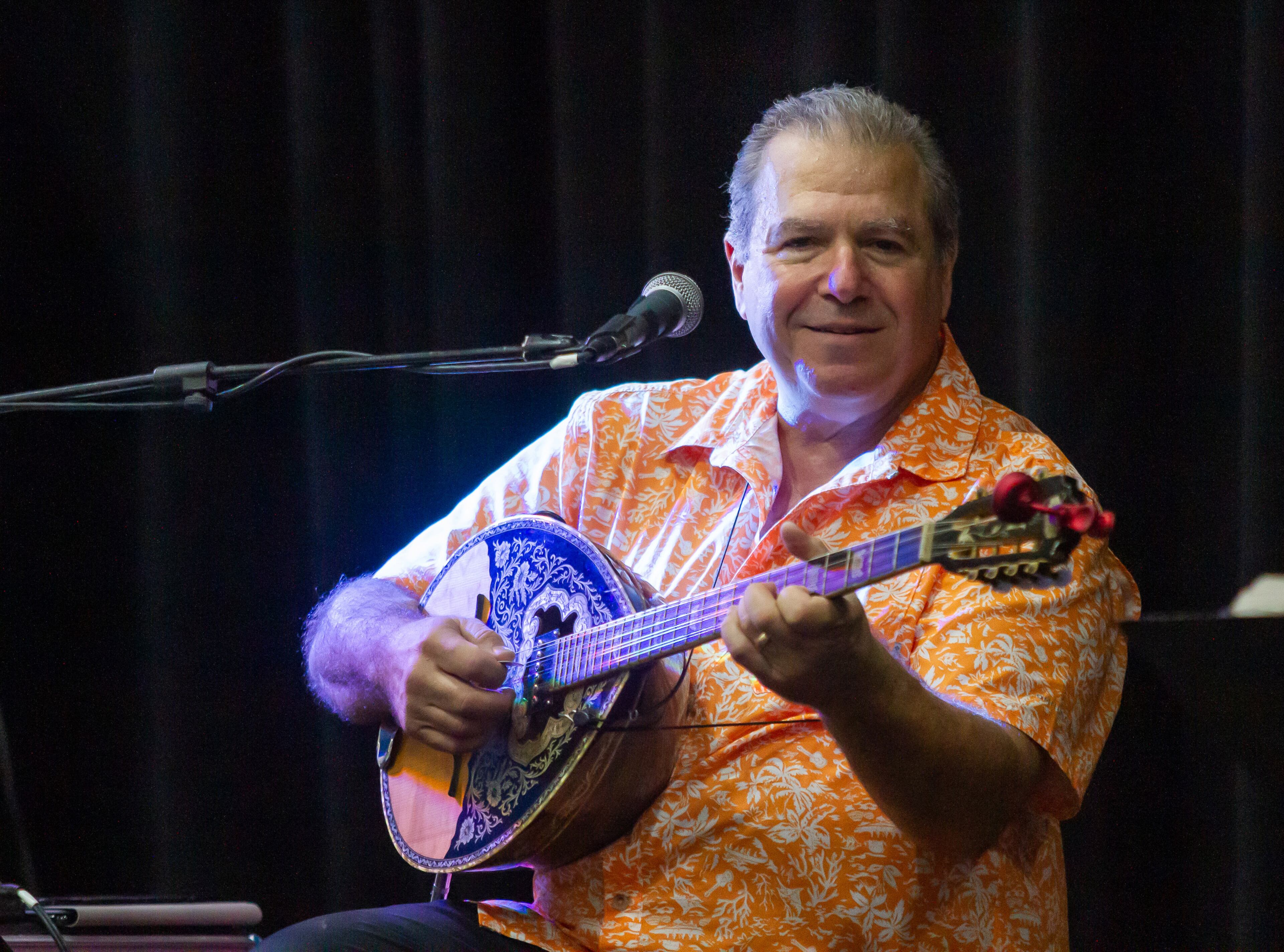 A musician plays the bouzouki on stage during the Atlanta Greek Festival on Sunday, September 29, 2019.STEVE SCHAEFER / SPECIAL TO THE AJC