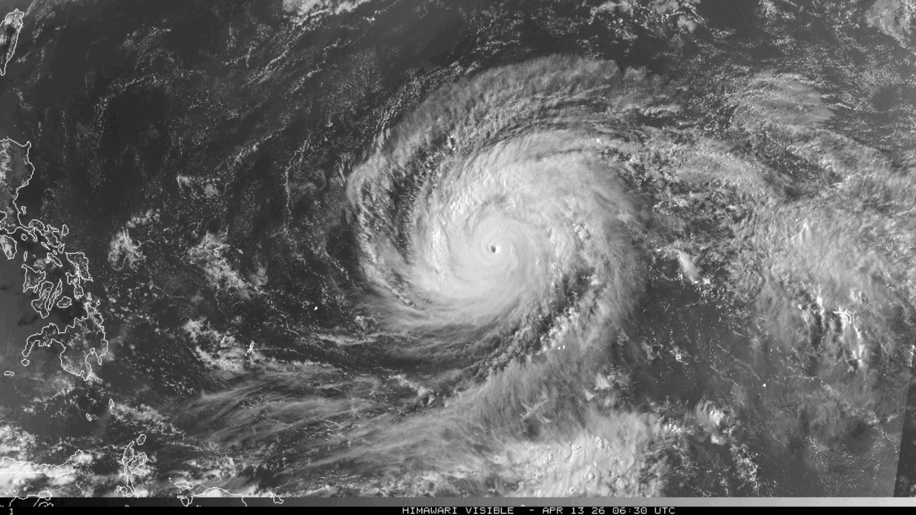 This satellite image provided by the National Oceanographic and Atmospheric Administration (NOAA) shows super typhoon Sinlakua in the Pacific Ocean, Monday, April 13, 2026. (NOAA via AP)
