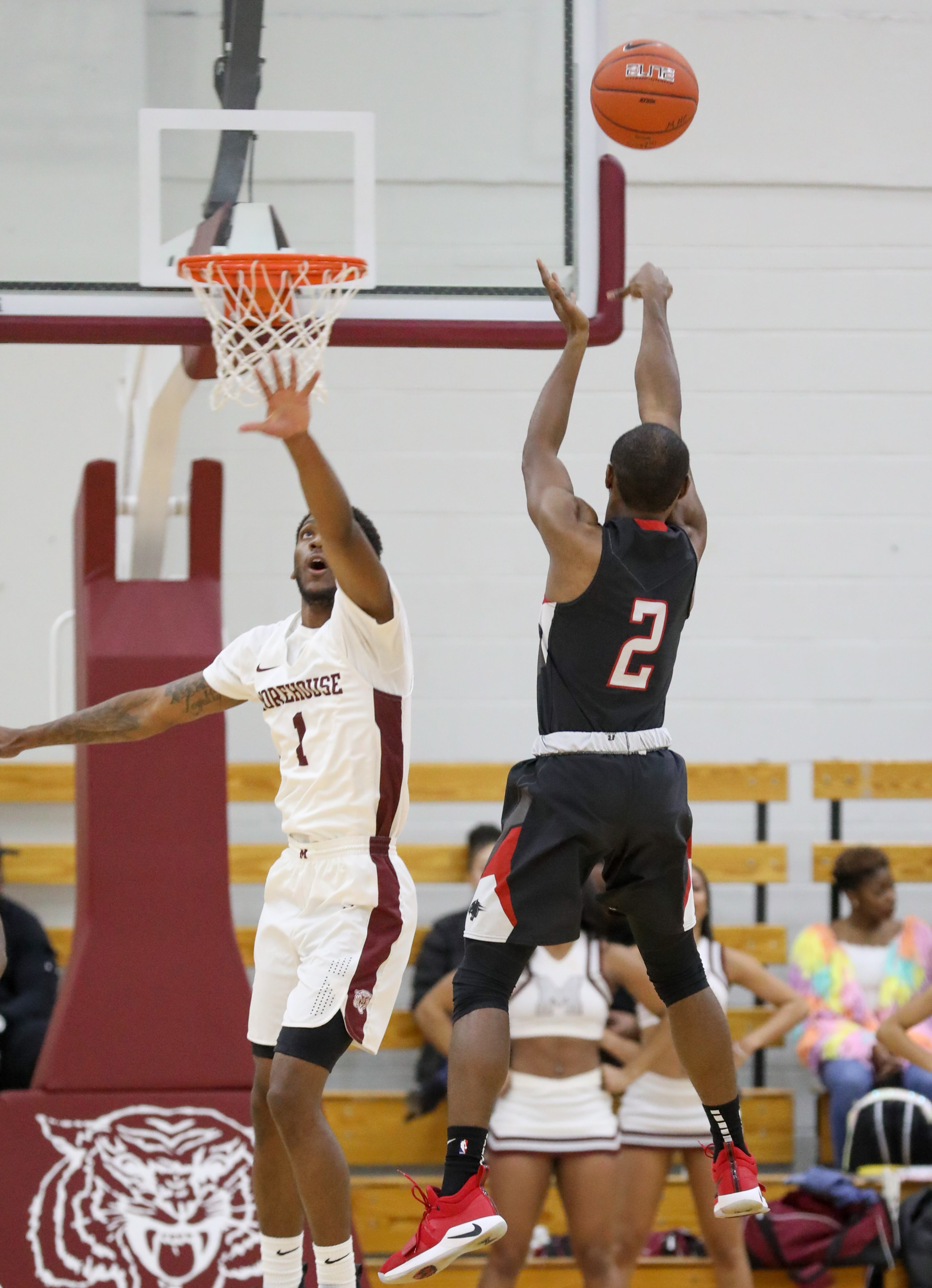 Clark Atlanta guard Ian Roach (2) shoots the ball while being defended by Morehouse guard Robert Andrews during a college basketball game at Morehouse College, Saturday, Feb. 9, 2019, in Atlanta. BRANDEN CAMP/SPECIAL