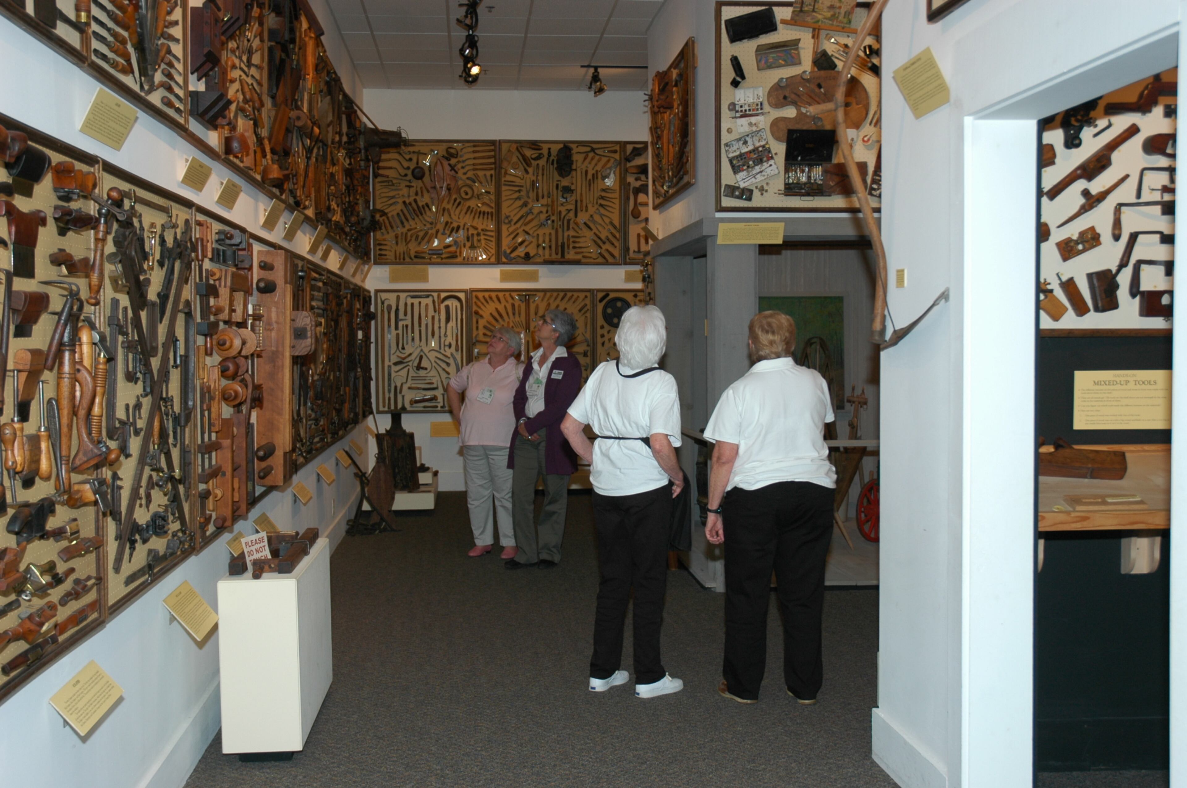 Guests at the Funk Heritage Center explore the Tools of the Trades exhibit, a collection of historical hand tools. Photo Credit: Funk Heritage Center. HANDOUT PHOTO - NOT FOR RESALE