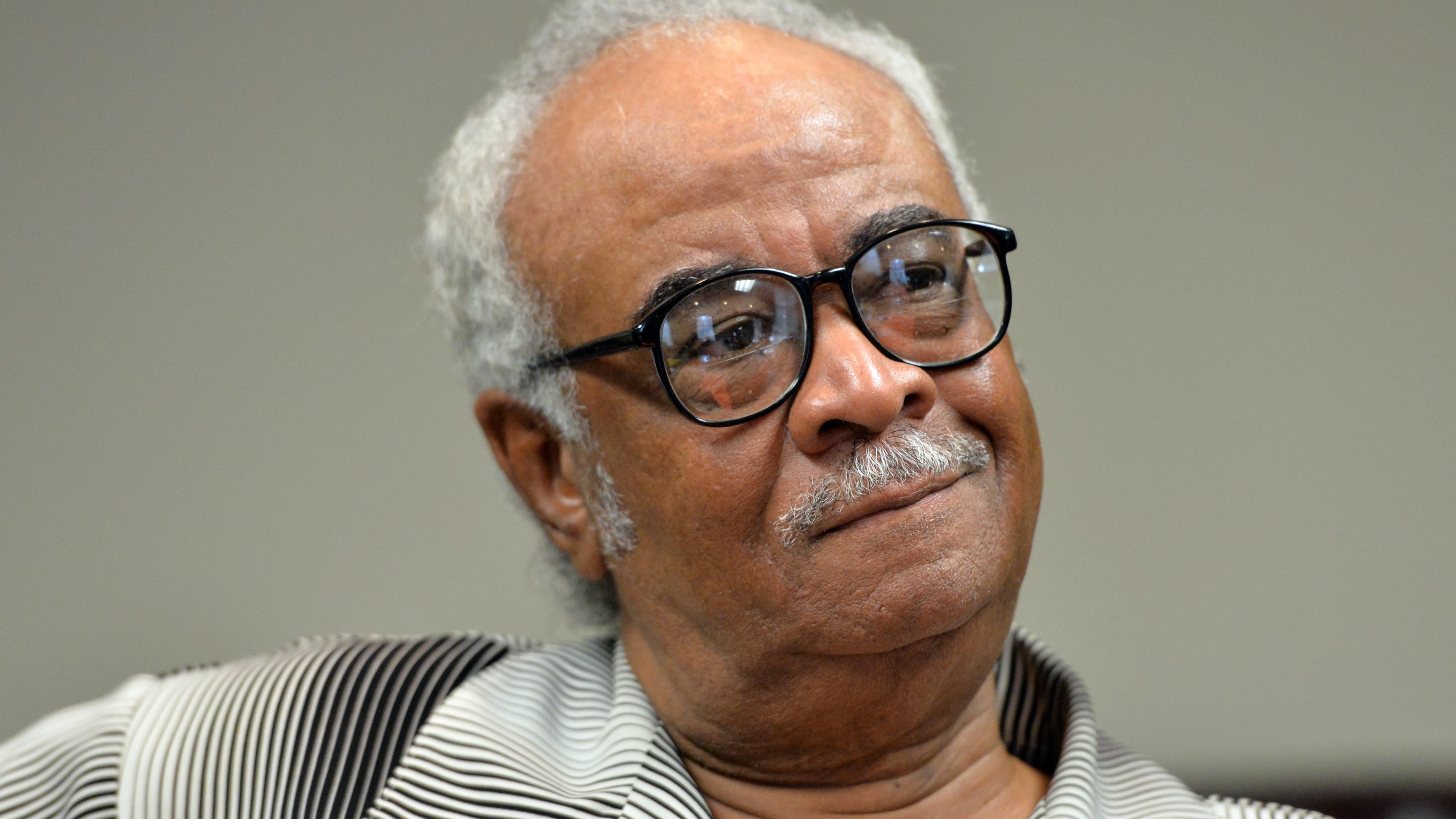 June 28, 2013 Atlanta - Rep. Tyrone Brooks waits for the panel appointed by Gov. Nathan Deal before a hearing on Friday, June 28, 2013. The panel of Attorney General Sam Olens, a Republican, House Minority Leader Stacey Abrams, D-Atlanta, and Senate Minority Leader Steve Henson, D-Tucker, all voted not to suspend Brooks, Gov. Nathan Deal's office told The Atlanta Journal-Constitution. Brooks, D-Atlanta, faces 30 federal charges of wire, tax and mail fraud related to his work with a pair of charities. The U.S. Attorney's office alleges that Brooks used contributions meant for those charities for his personal expenses. HYOSUB SHIN / HSHIN@AJC.COM Former Rep. Tyrone Brooks in 2013 (AJC file/Hyosub Shin)