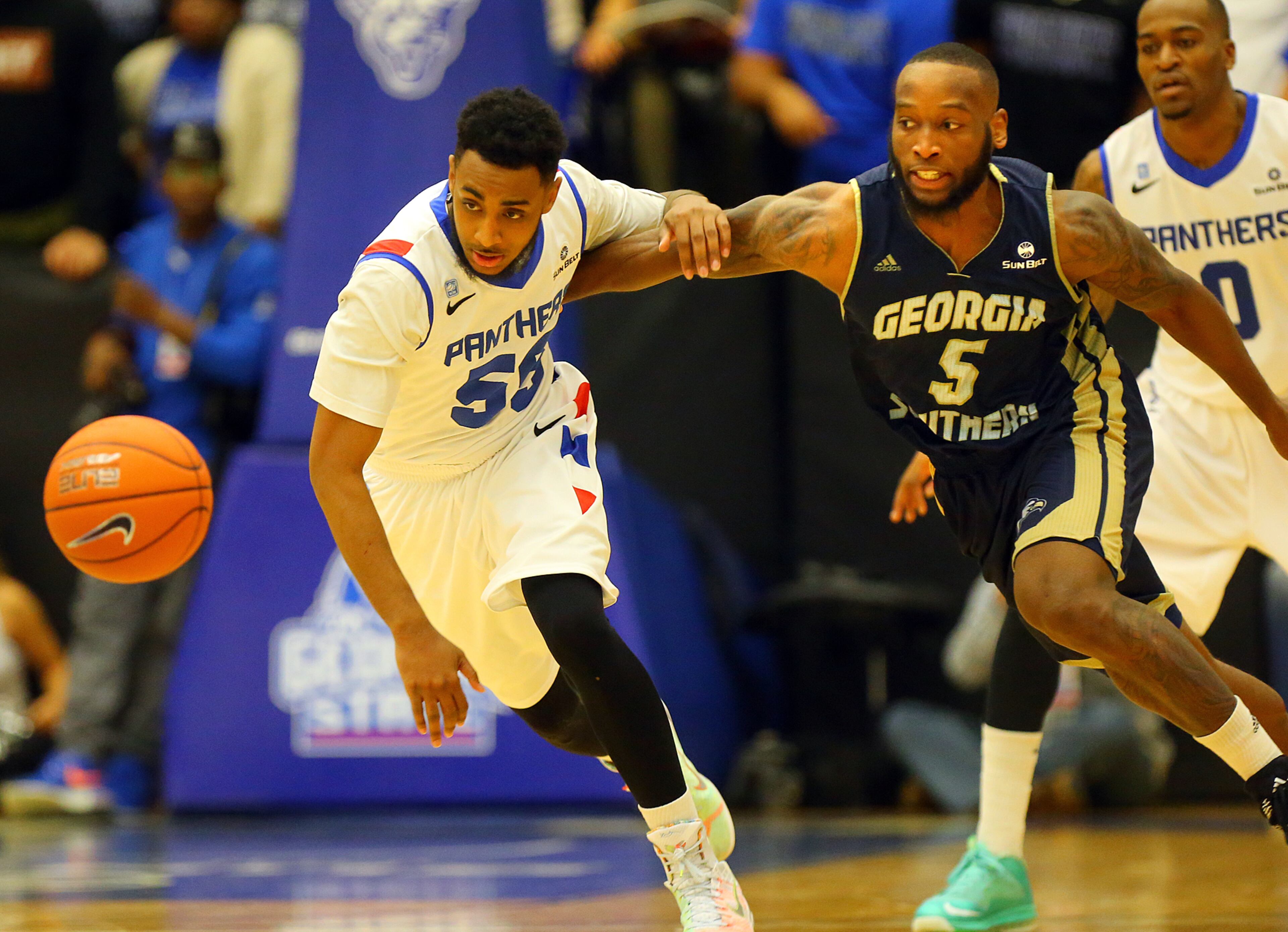 Georgia State guard Ryan Harrow steals from Georgia Southern guard Jelani Hewitt during a basketball game on Saturday, March 7, 2015, in Atlanta.
