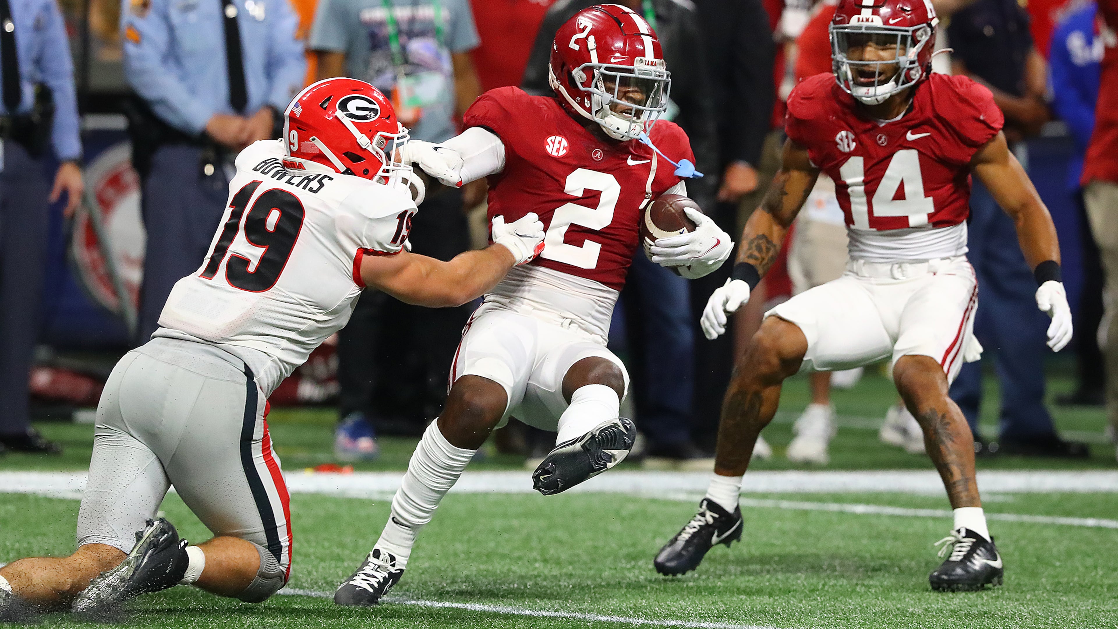 Alabama defensive back DeMarcco Hellams intercepts a Stetson Bennett pass intended for tight end Brock Bowers in the SEC Championship game on Saturday, Dec 4, 2021, in Atlanta. (Curtis Compton / AJC file)