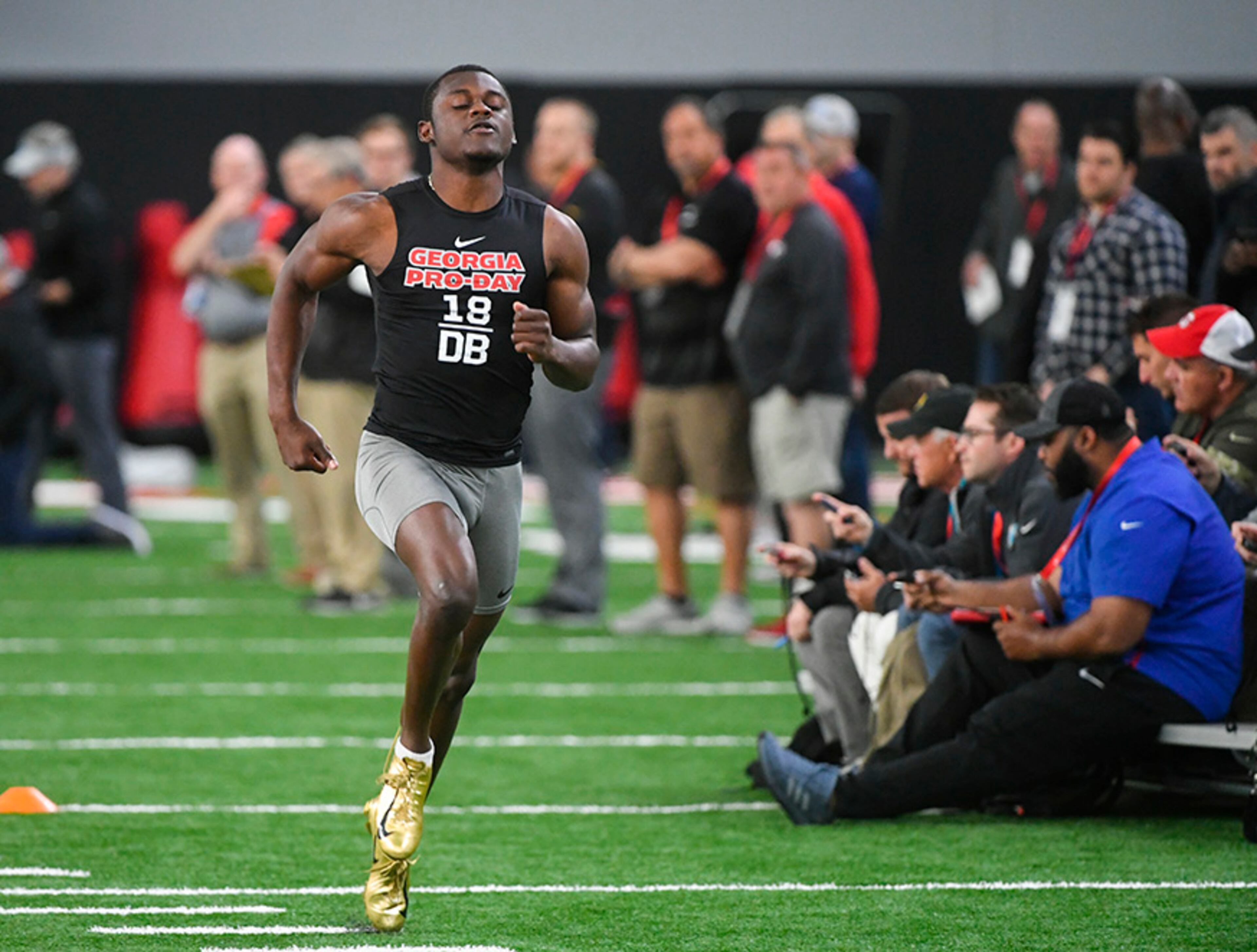 Cornerback Deandre Baker runs while getting combine tested by NFL scouts and coaches during Pro Day at the University of Georgia, Wednesday, March 20, 2019, in Athens.