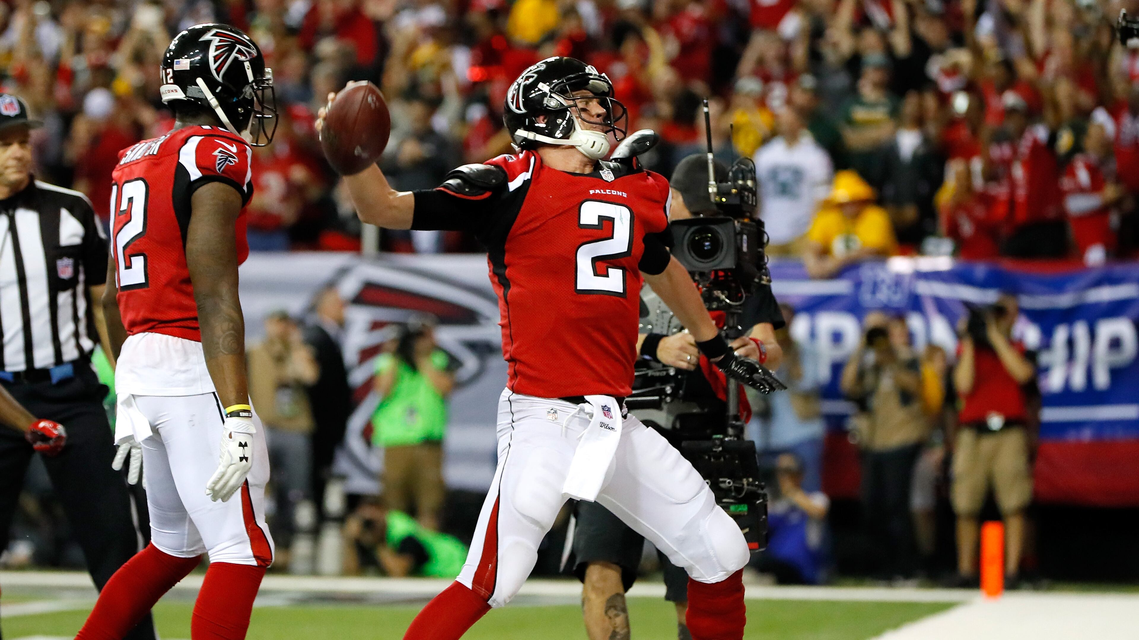 Matt Ryan #2 of the Atlanta Falcons celebrates after running for a 14 yard touchdown in the second quarter against the Green Bay Packers in the NFC Championship Game at the Georgia Dome on January 22, 2017 in Atlanta, Georgia. (Photo by Kevin C. Cox/Getty Images)