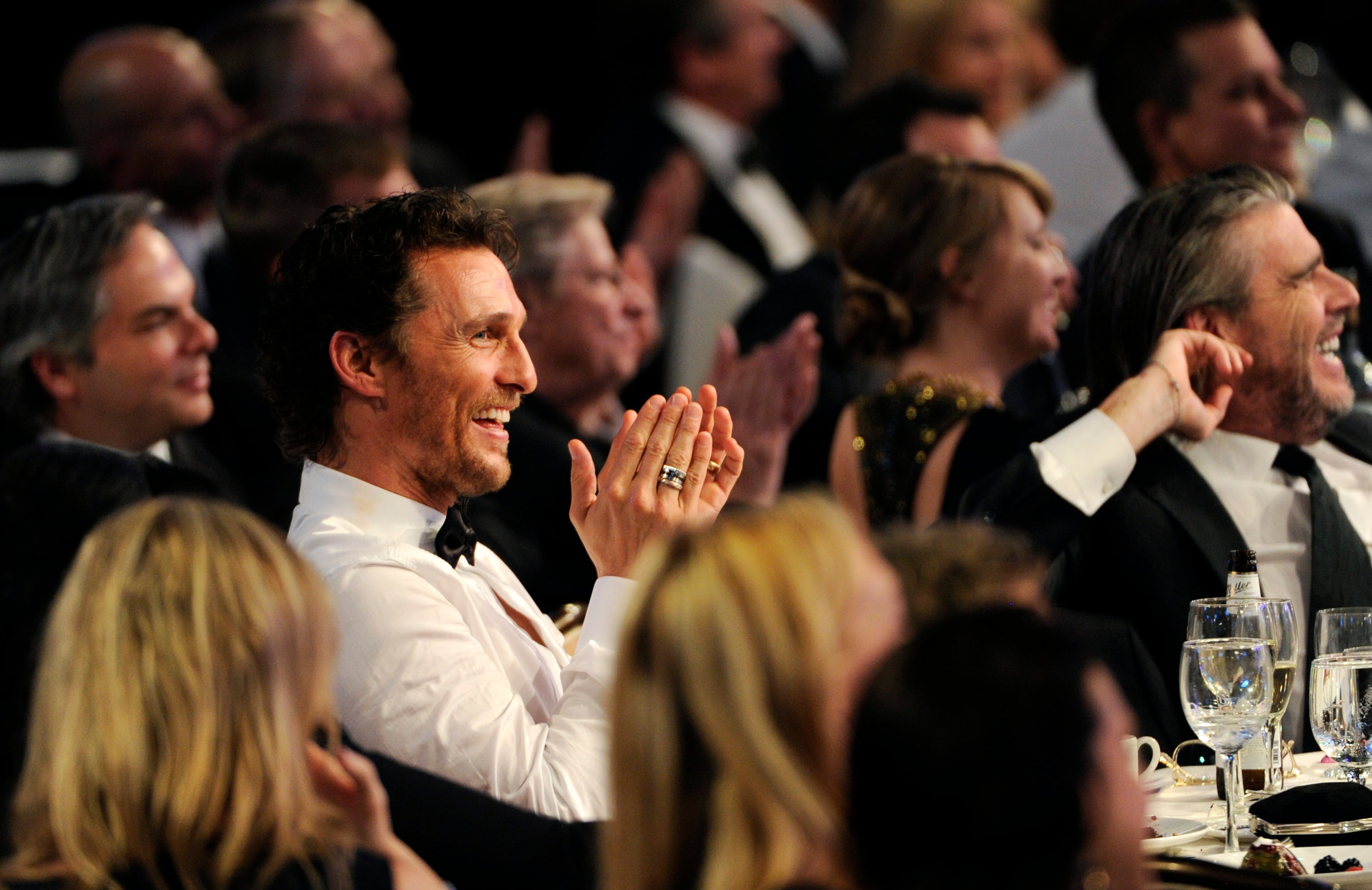 Honoree Matthew McConaughey, left, reacts in the audience during the American Cinematheque Award Presentation to McConaughey at the Beverly Hilton on Tuesday, Oct. 21, 2014, in Beverly Hills, Calif. (Photo by Chris Pizzello/Invision/AP)