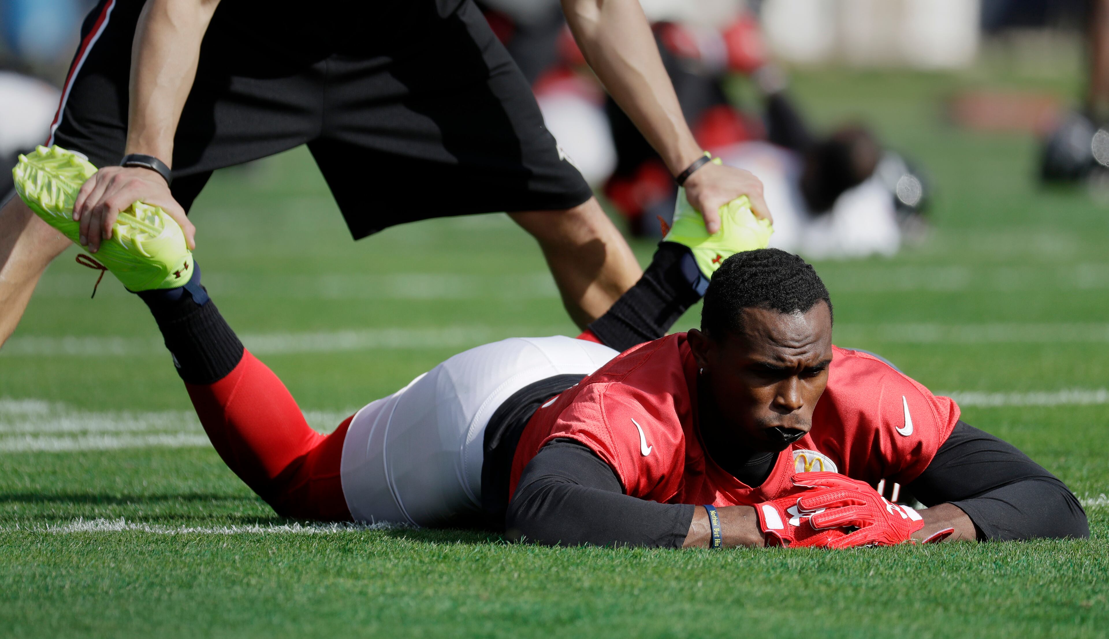 Atlanta Falcons wide receiver Julio Jones (11) stretches during a practice for the NFL Super Bowl 51 football game Wednesday, Feb. 1, 2017, in Houston. Atlanta will face the New England Patriots in the Super Bowl Sunday. (AP Photo/Eric Gay)
