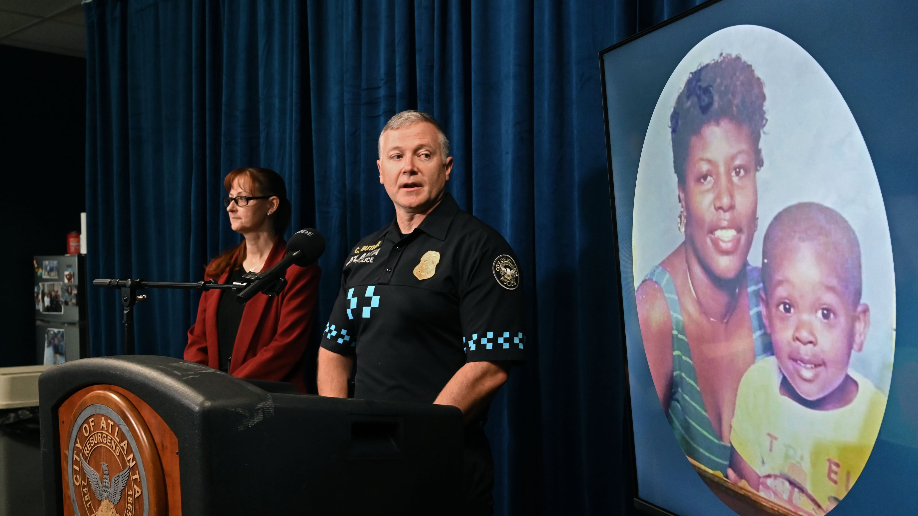 Atlanta police Lt. Christapher Butler and detective Summer Benton announce the arrest of Bridgett Lockhart's boyfriend nearly 27 years after she was killed. (Hyosub Shin/AJC)