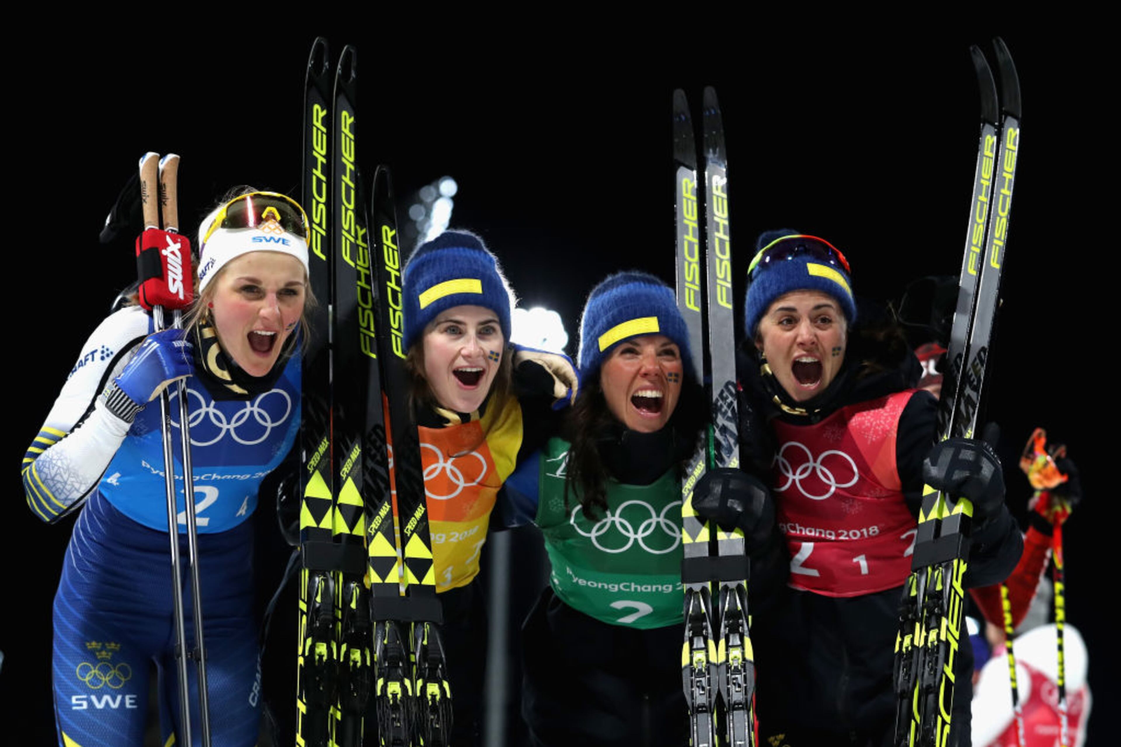 PYEONGCHANG-GUN, SOUTH KOREA - FEBRUARY 17: Silver medalists Stina Nilsson, Ebba Andersson, Charlotte Kalla and Anna Haag of Sweden celebrate after the Ladies' 4x5km Relay on day eight of the PyeongChang 2018 Winter Olympic Games at Alpensia Cross-Country Centre on February 17, 2018 in Pyeongchang-gun, South Korea. (Photo by Al Bello/Getty Images)