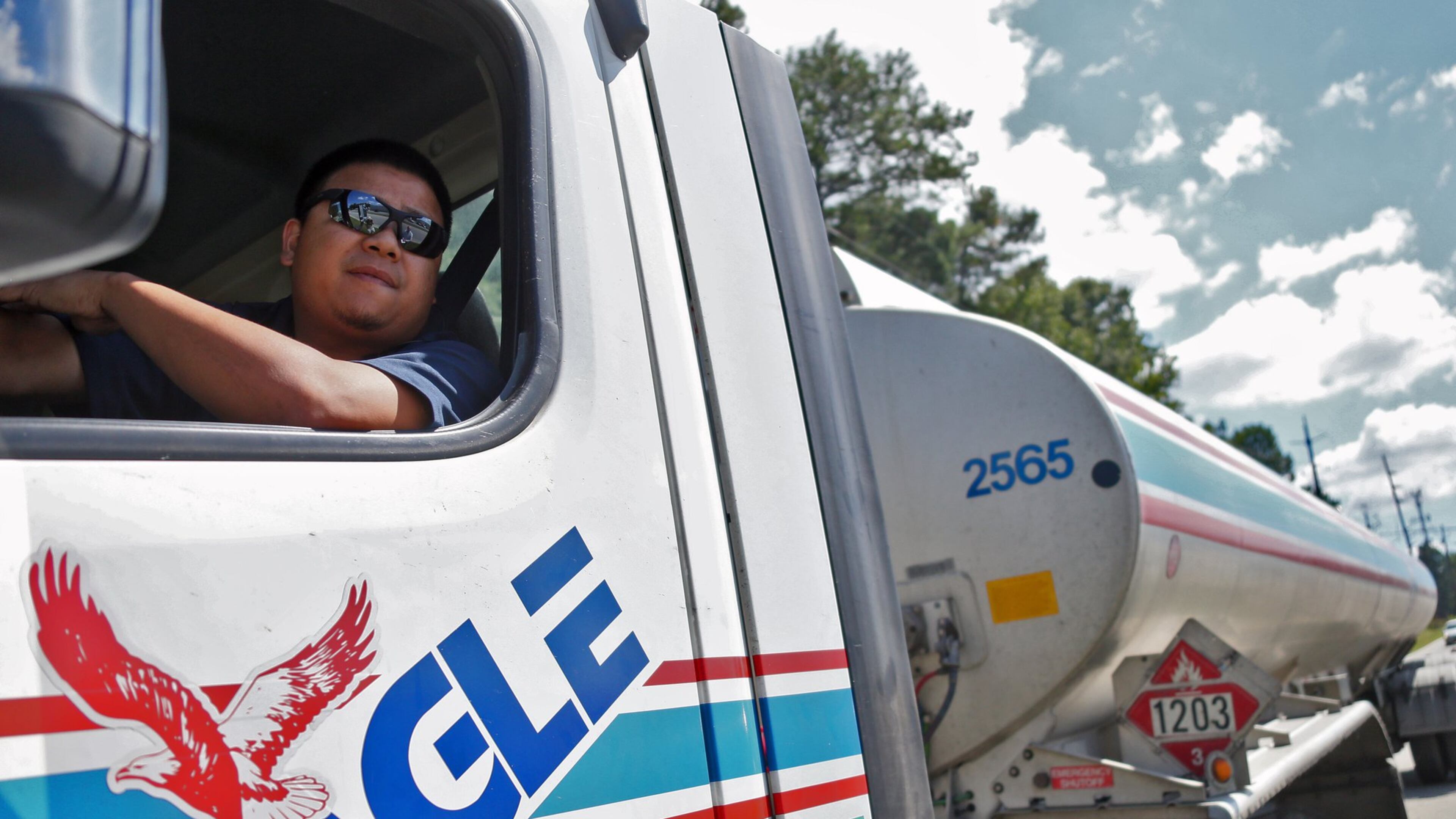 Hieu Hoang waits in line for his turn to fill his tanker at one of the Doraville pipeline terminals. The gas shortage in metro Atlanta was already easing Wednesday, with pipeline repairs expected to restore the flow soon. BOB ANDRES /BANDRES@AJC.COM
