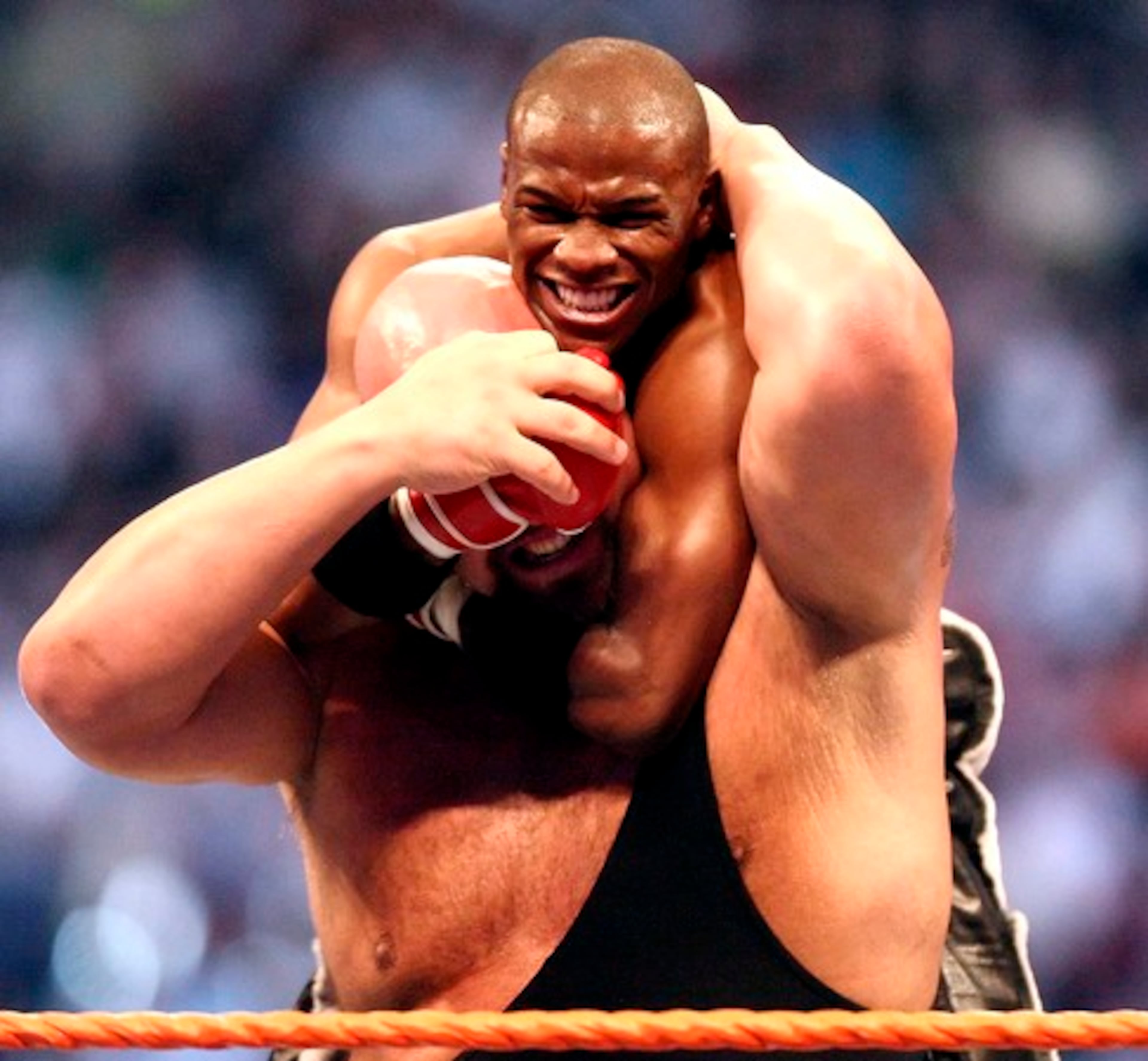 The Big Show wrestles Floyd Mayweather Jr., top, during WrestleMania XXIV. Mayweather got out of the grip to win the match Sunday.