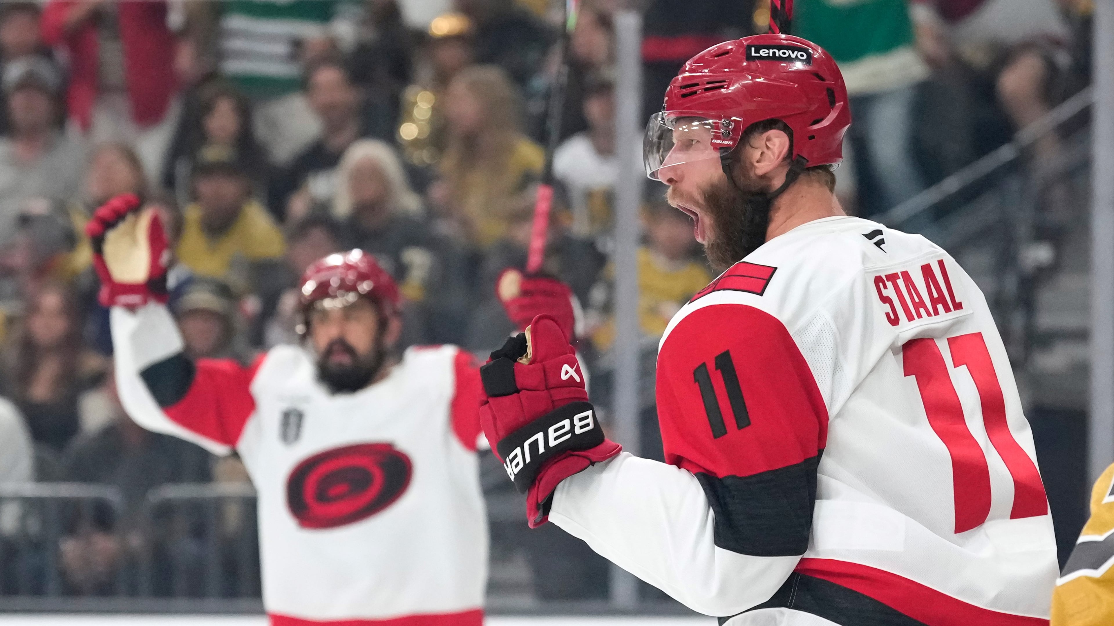 Carolina Hurricanes center Jordan Staal, right, celebrates his goal during the first period in Game 4 of the NHL hockey Stanley Cup Final series against the Vegas Golden Knights, Tuesday, June 9, 2026, in Las Vegas. (AP Photo/John Locher)