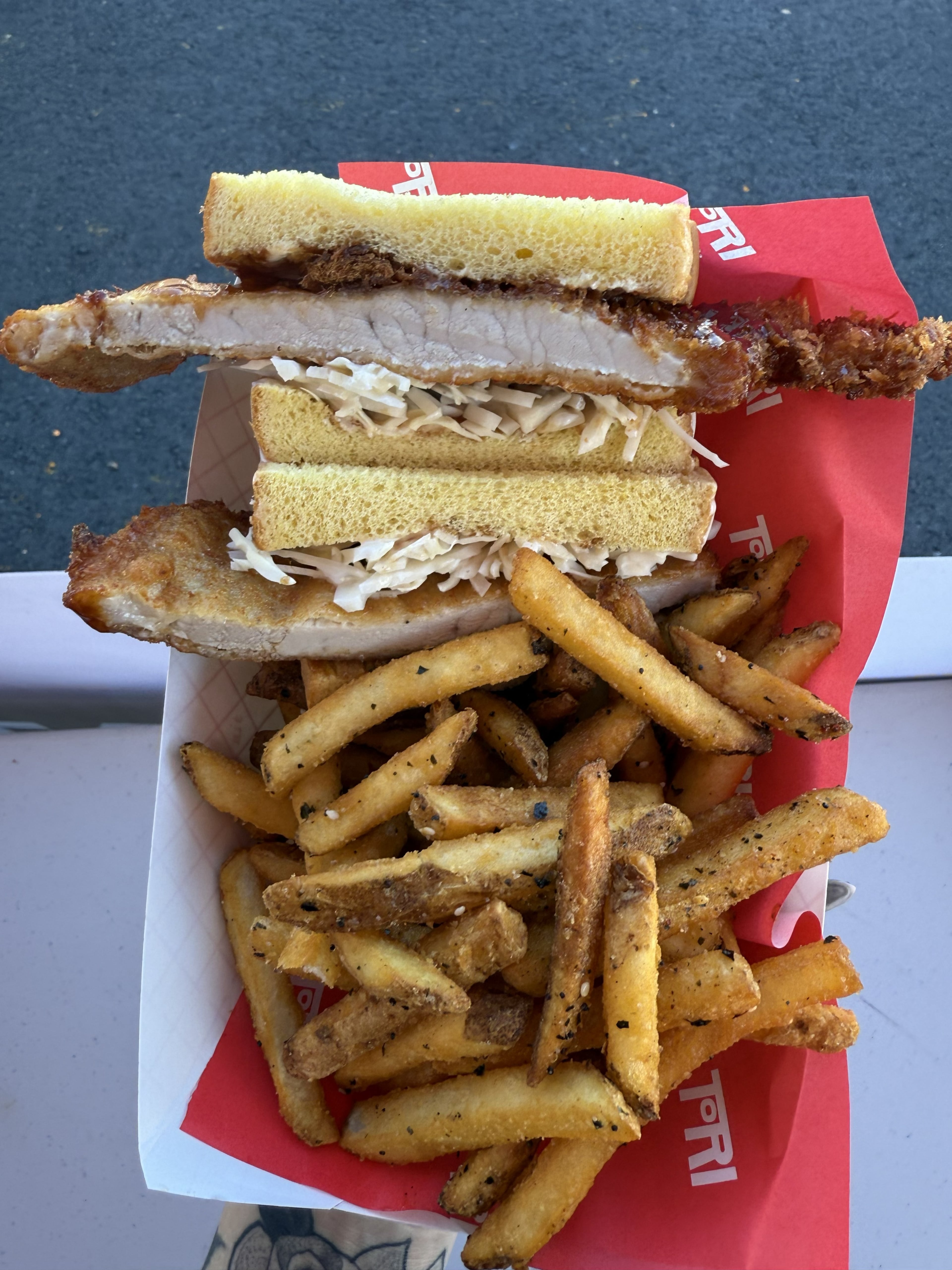 Tori’s pork katsu sando with fries. (Courtesy of Meghan Rae)