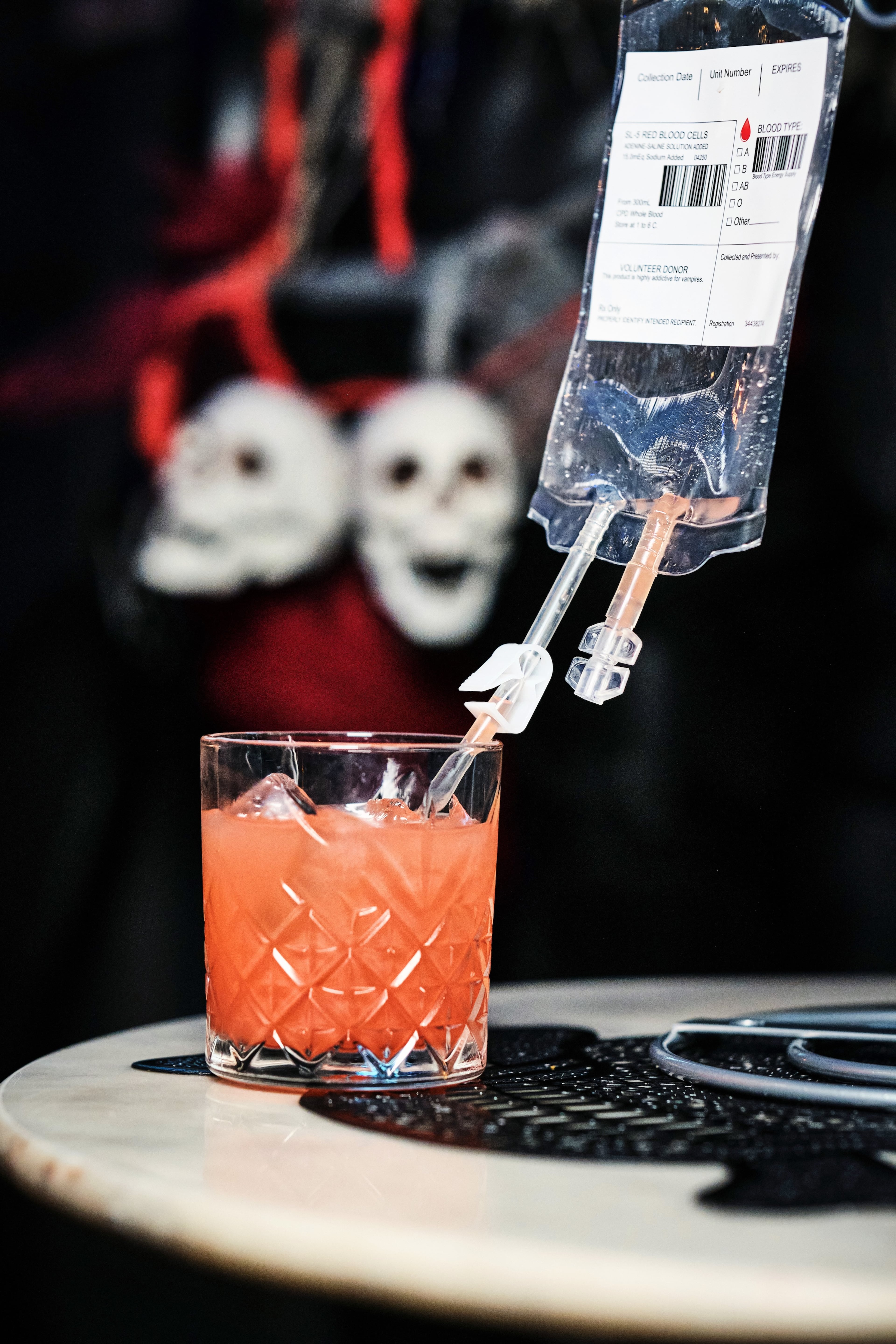 The Red Blood Moon Margarita, made with blood orange and amaretto, is served in a blood bag at Wicked Pig's pop-up inside Midtown's Tin Lizzy's. (Courtesy of Brandon Amato)