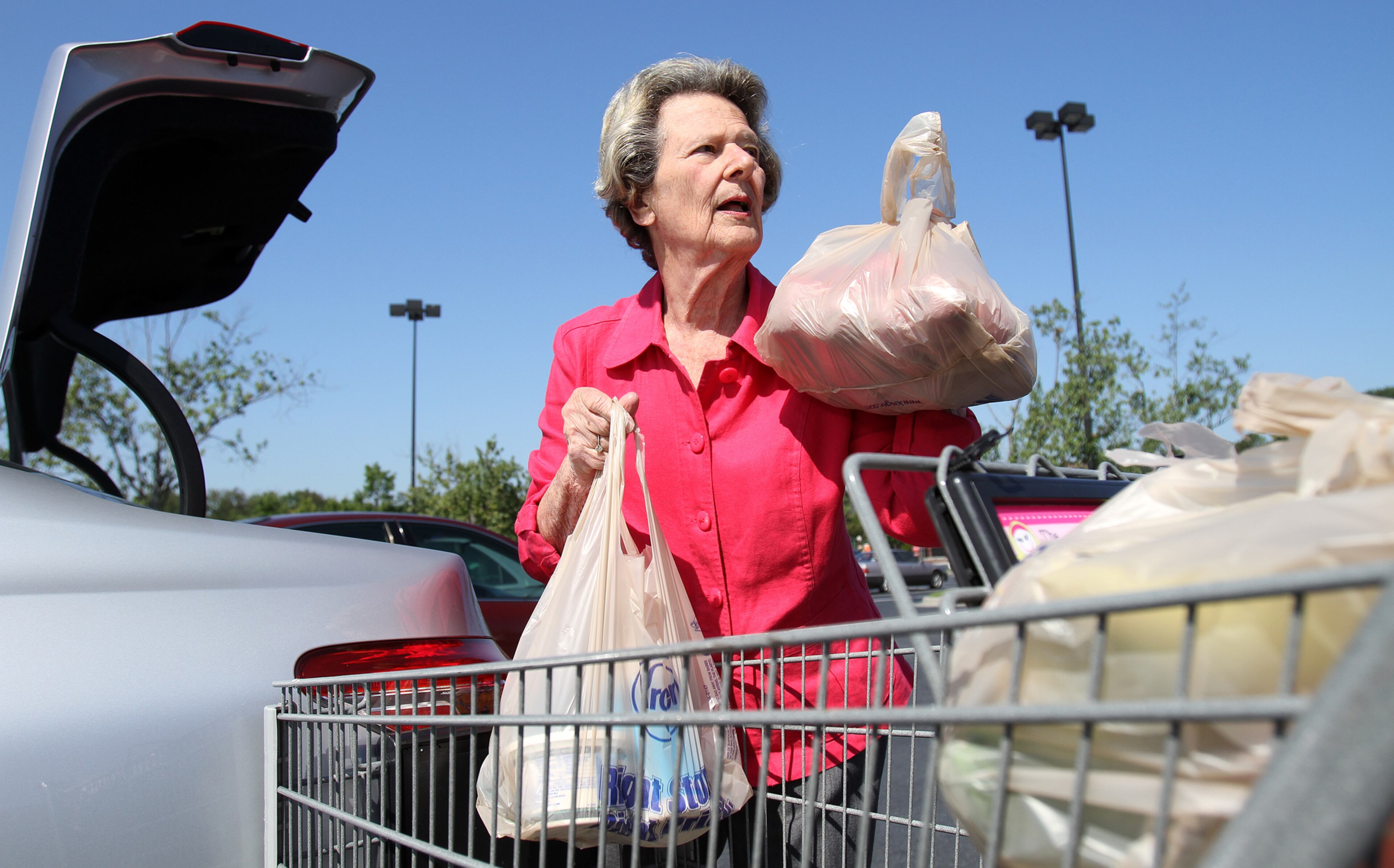 Eva Galambos loading her groceries at the City Walk Kroger parking lot in 2012. After decades of campaigning for Sandy Springs cityhood, Galambos became the town's first mayor in 2005.