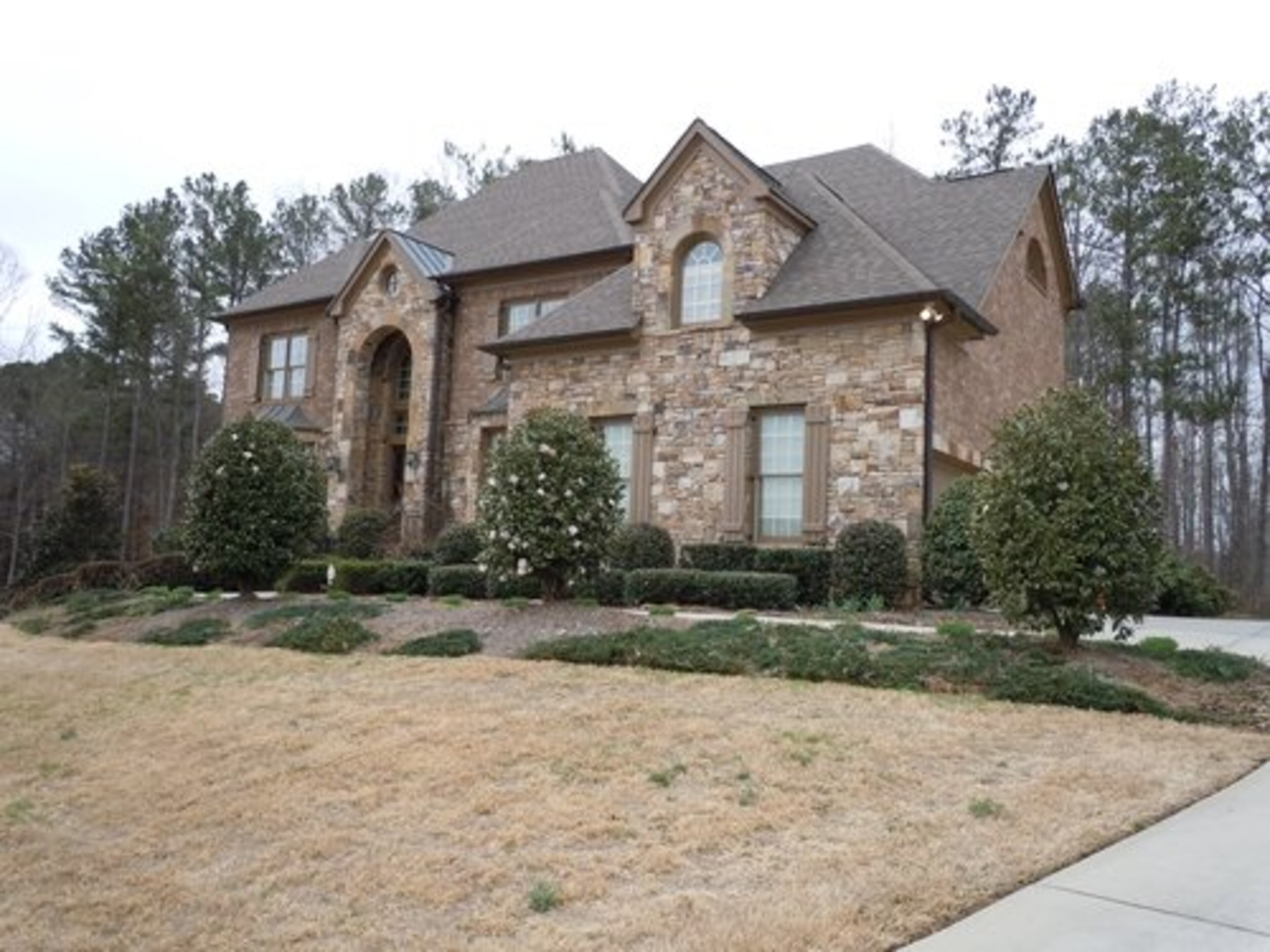 The Dearing's designed the fa ade of their 6,000 square foot English Tudor in Southwest Atlanta. The home in the Guilford Forest subdivision was built by John Wieland Homes.