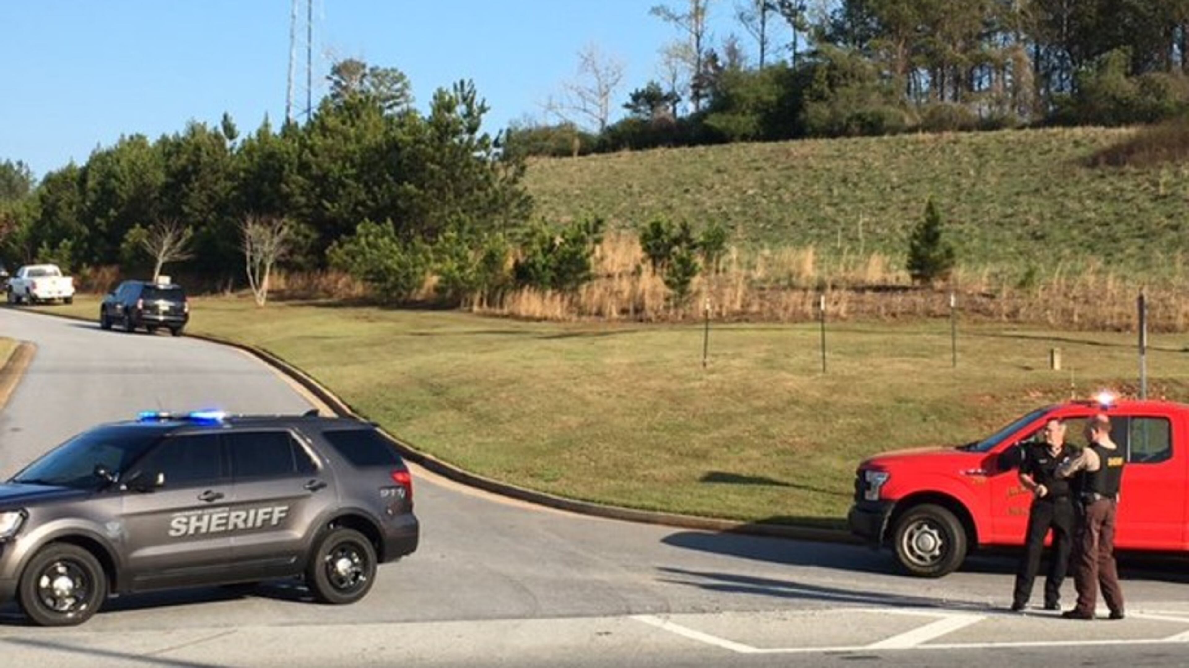 Jackson County Comprehensive High School was evacuated Wednesday after a 16-year-old student called 911 about an active shooter. The student is now charged with disrupting operations of a public school, transmitting a false public alarm, unlawful conduct during a 911 call and false report of a crime. (Credit: Channel 2 Action News)