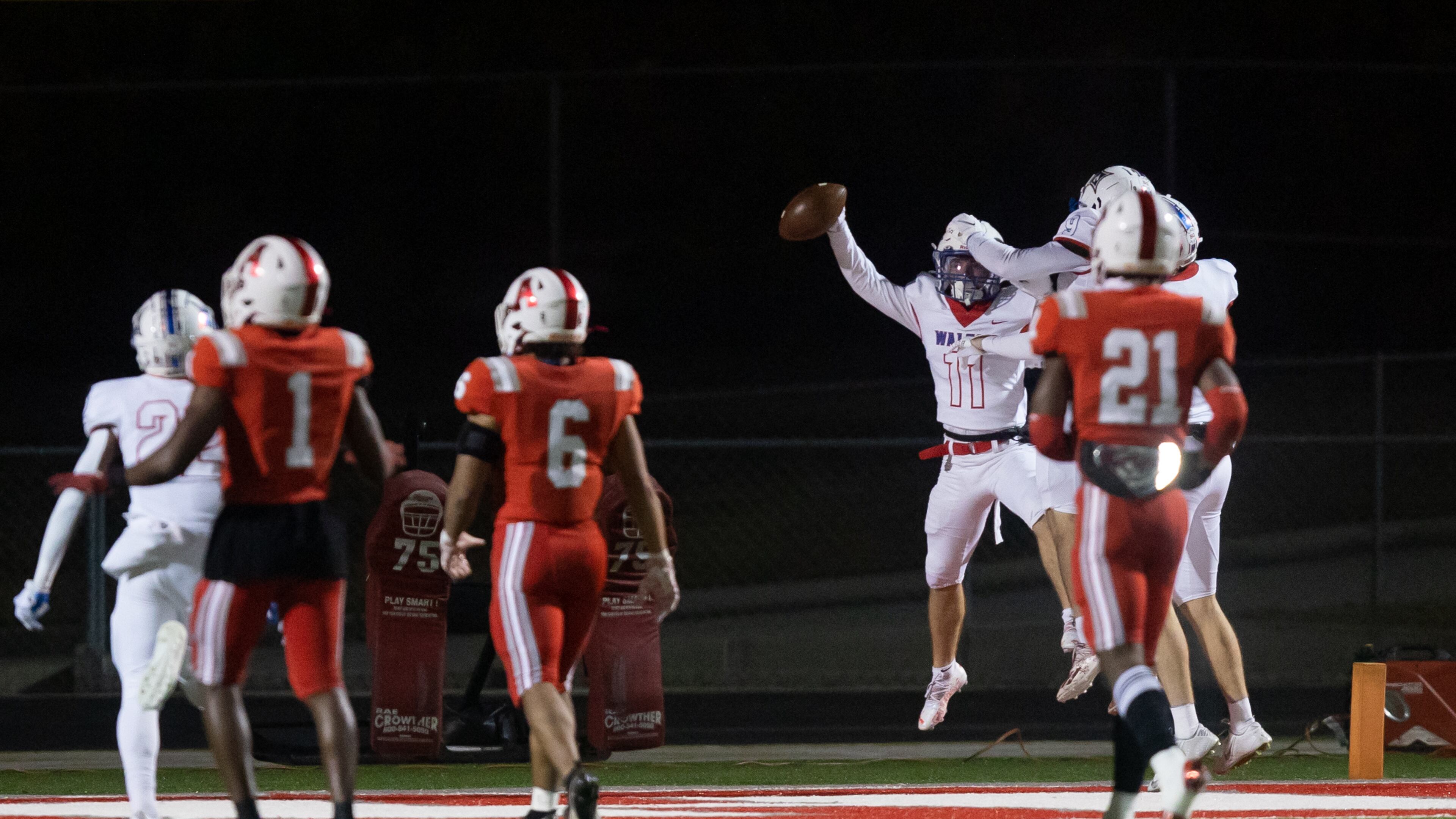 Walton's Nate Lyons (11) celebrates a touchdown during a GHSA high school football playoff game between the Archer Tigers and the Walton Raiders at Archer High School in Lawrenceville, GA., on Friday, November 19, 2021. (Photo/Jenn Finch)
