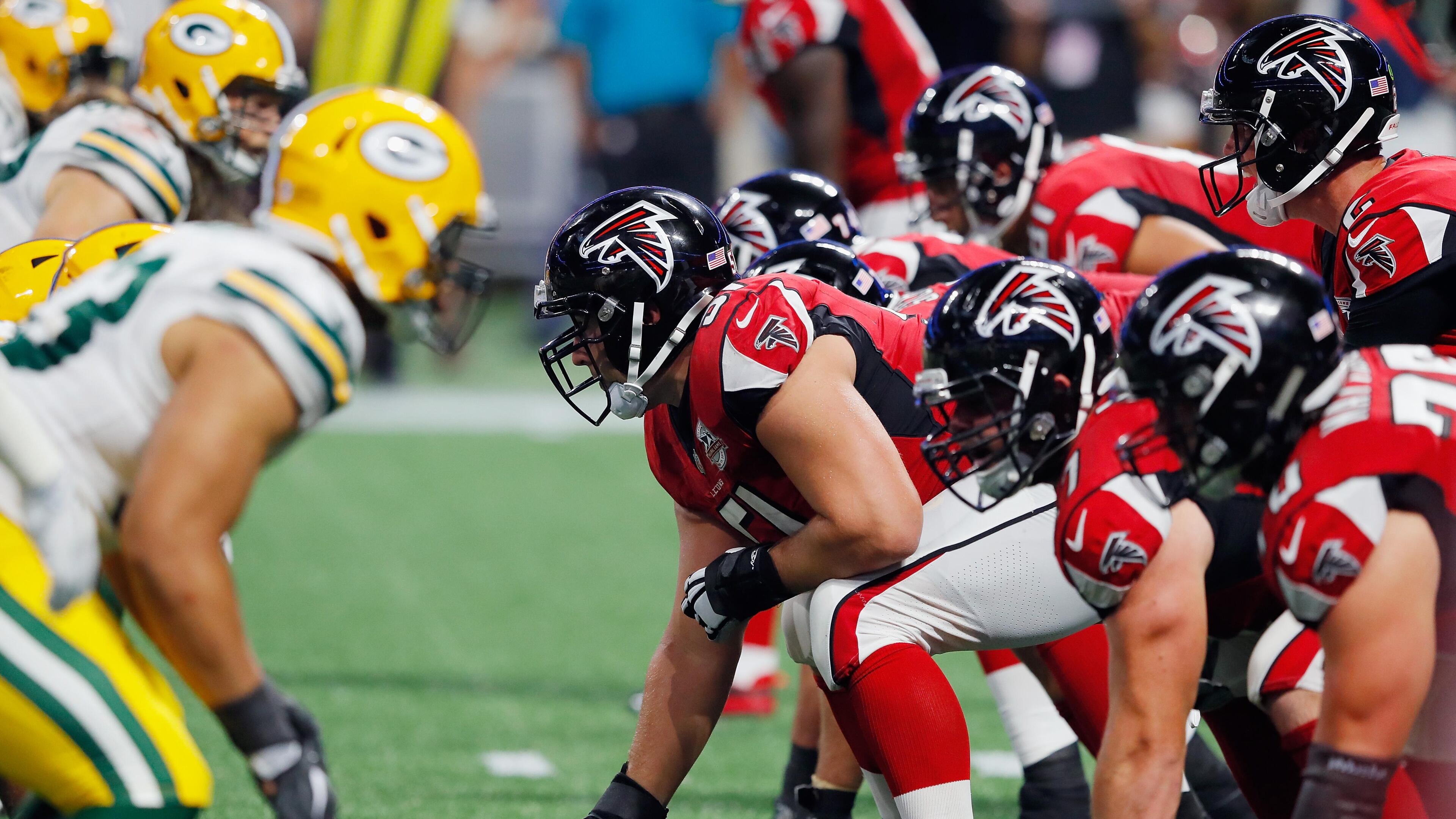 Falcons center Alex Mack #51 prepares to snap the ball during the second half against the Packers at Mercedes-Benz Stadium on September 17, in Atlanta