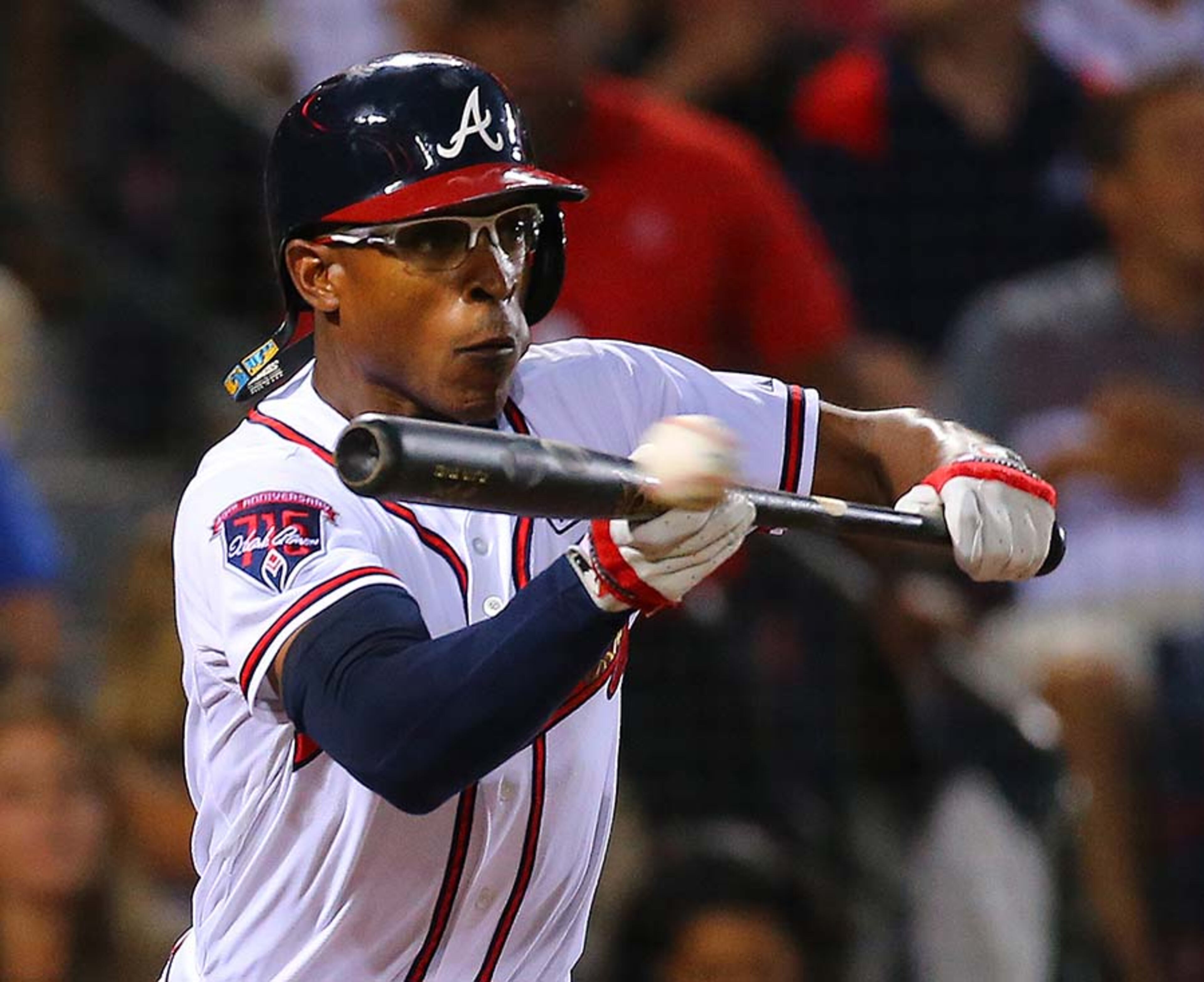Braves outfielder B.J. Upton bunts for a single reaching first safely during the fifth inning against the Dodgers Monday at Turner Field in Atlanta.