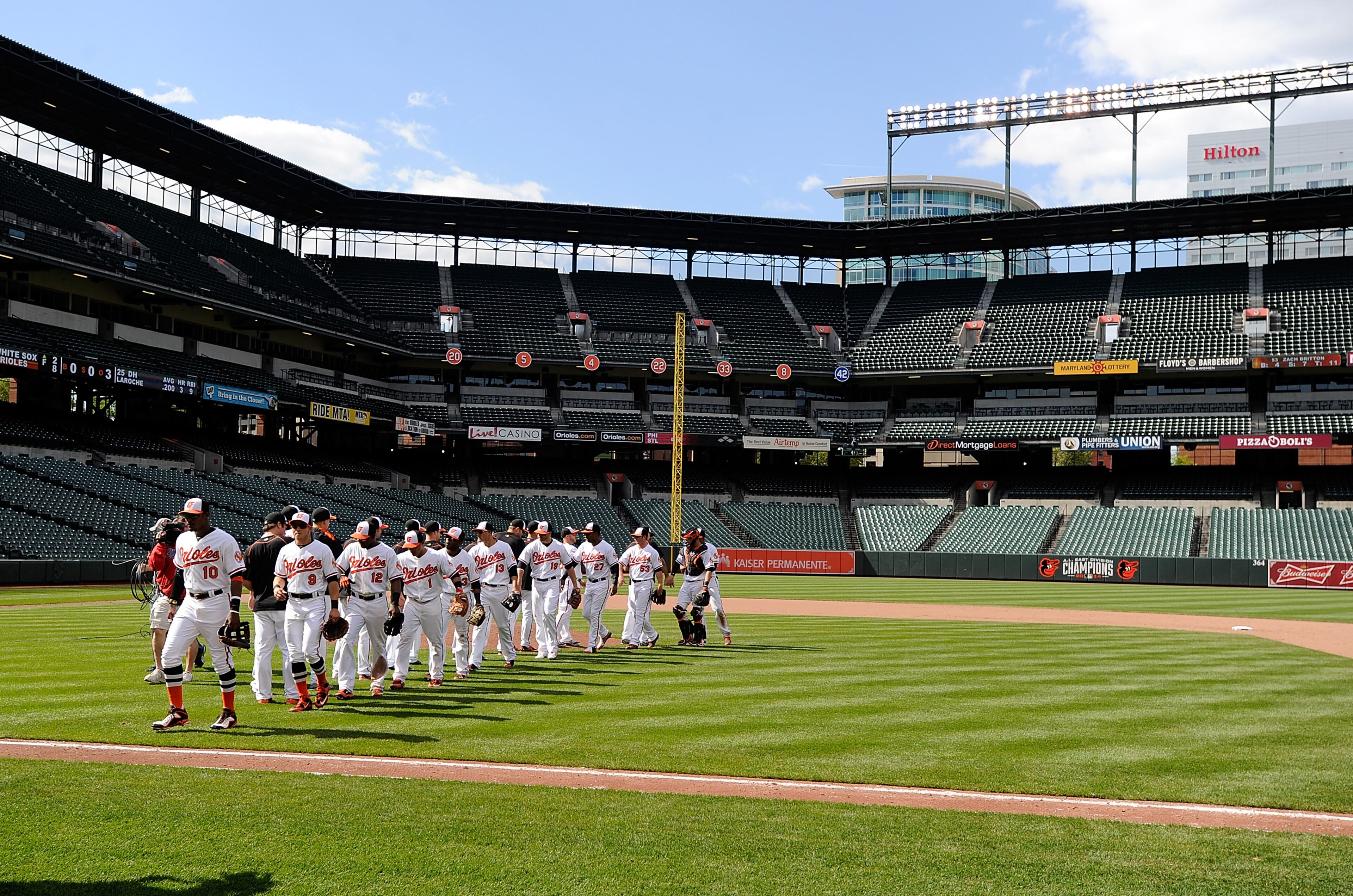 BALTIMORE, MD - APRIL 29: The Baltimore Orioles celebrate after a 8-2 victory against the Chicago White Sox at Oriole Park at Camden Yards on April 29, 2015 in Baltimore, Maryland. The game was played without spectators due to the social unrest in Baltimore. (Photo by Greg Fiume/Getty Images)
