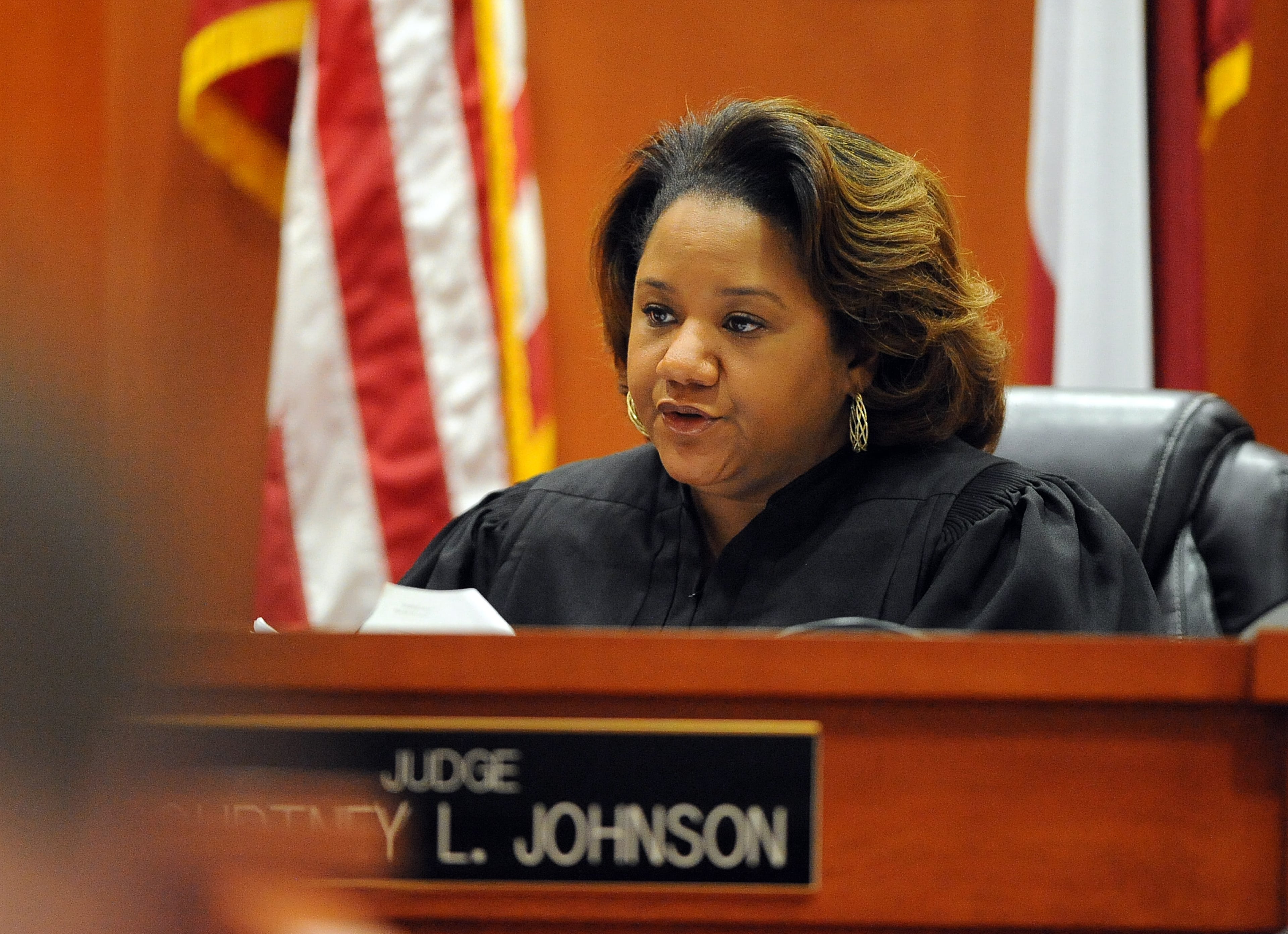 DeKalb Superior Court Judge Courtney L. Johnson polls the jury as to their verdicts. DeKalb CEO Burrell Ellis was found guilty on 4 counts in his retrial before Superior Court Judge Courtney Johnson Wednesday, July 1, 2015.