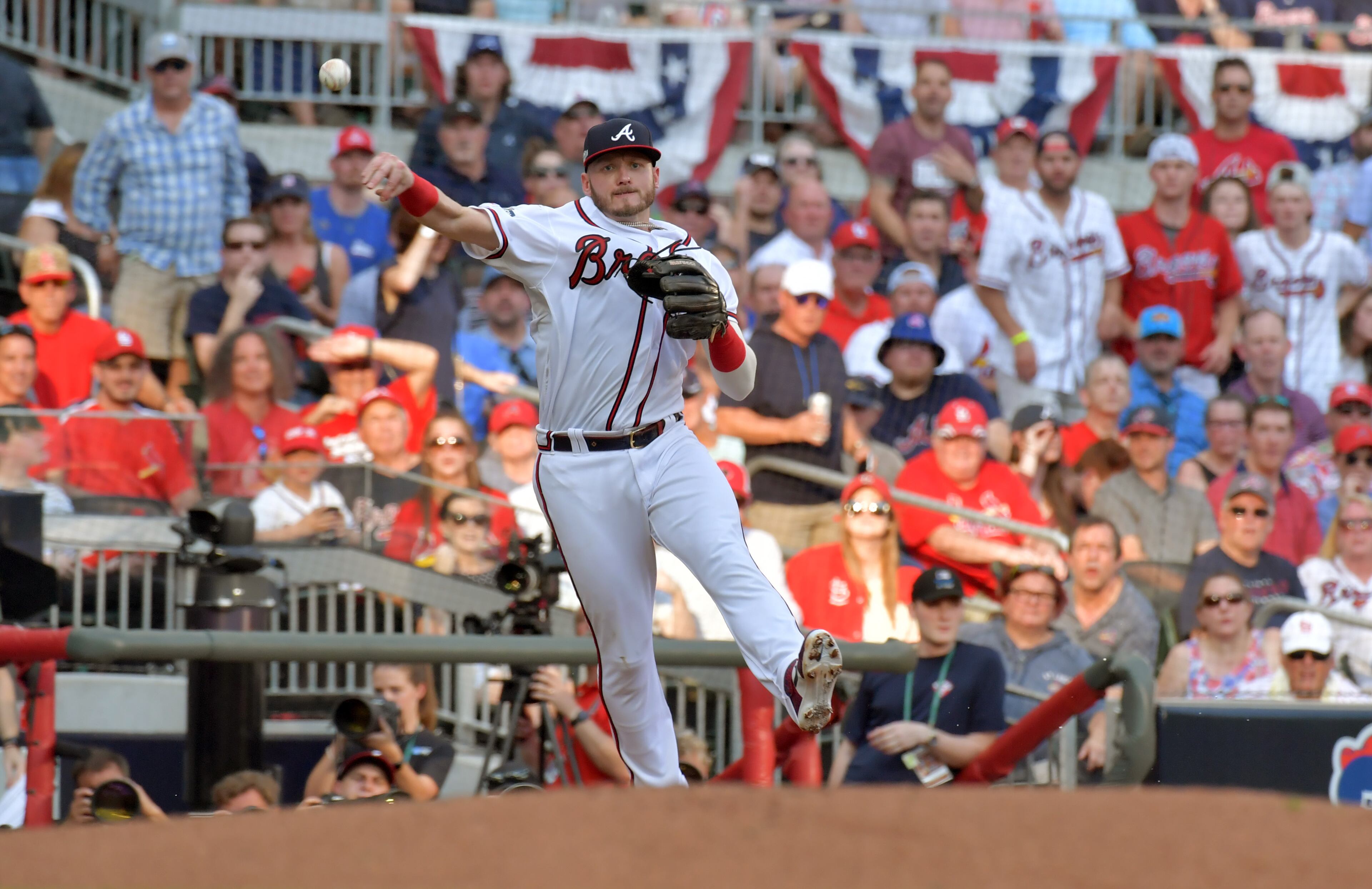Braves third baseman Josh Donaldson (20) throws out St. Louis Cardinals catcher Yadier Molina (not pictured) at first base. (Hyosub Shin / Hyosub.Shin@ajc.com)