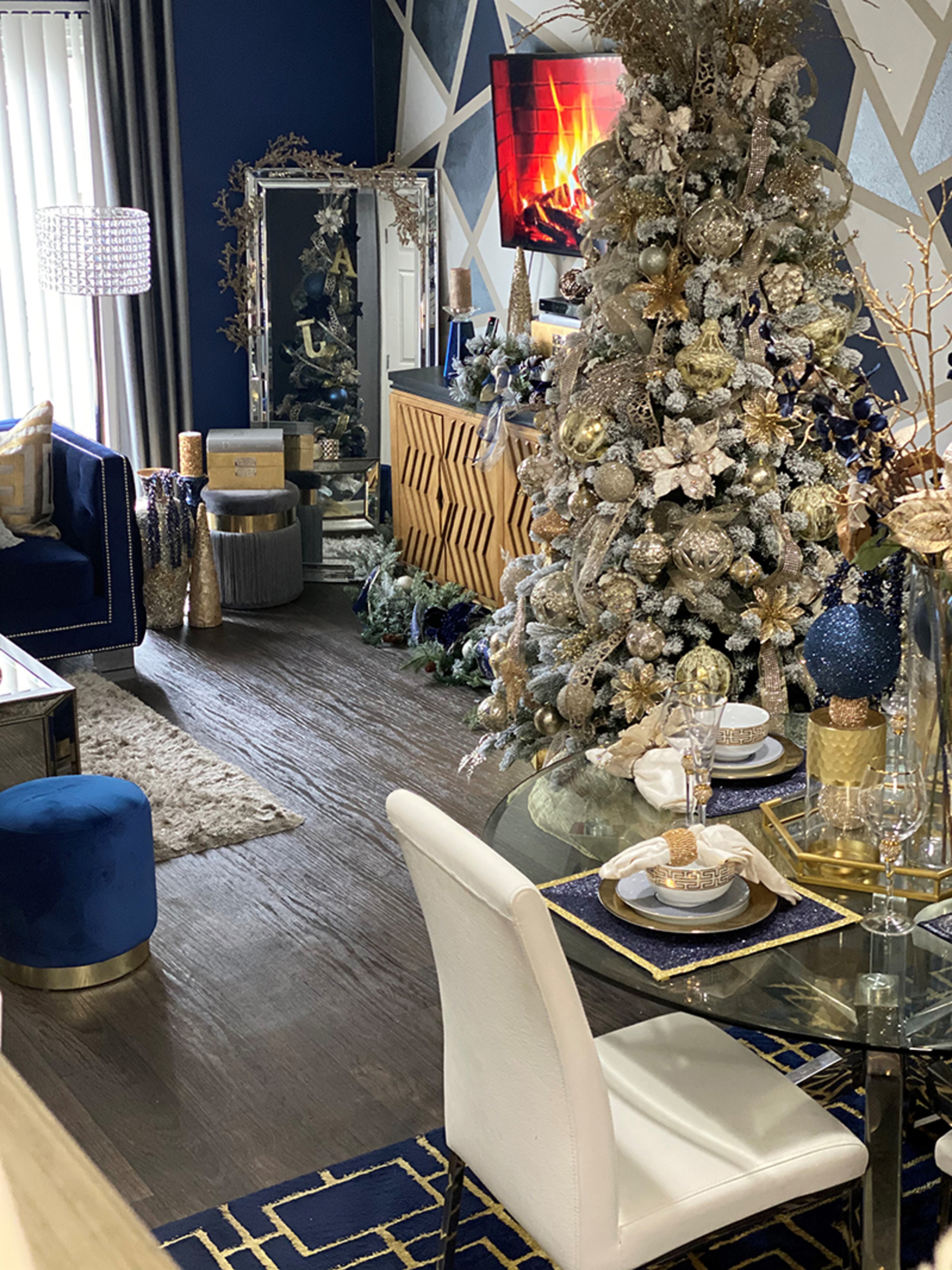 Ae’Jay Graham's stunning blue and gold tree perfectly coordinates with the rest of room.